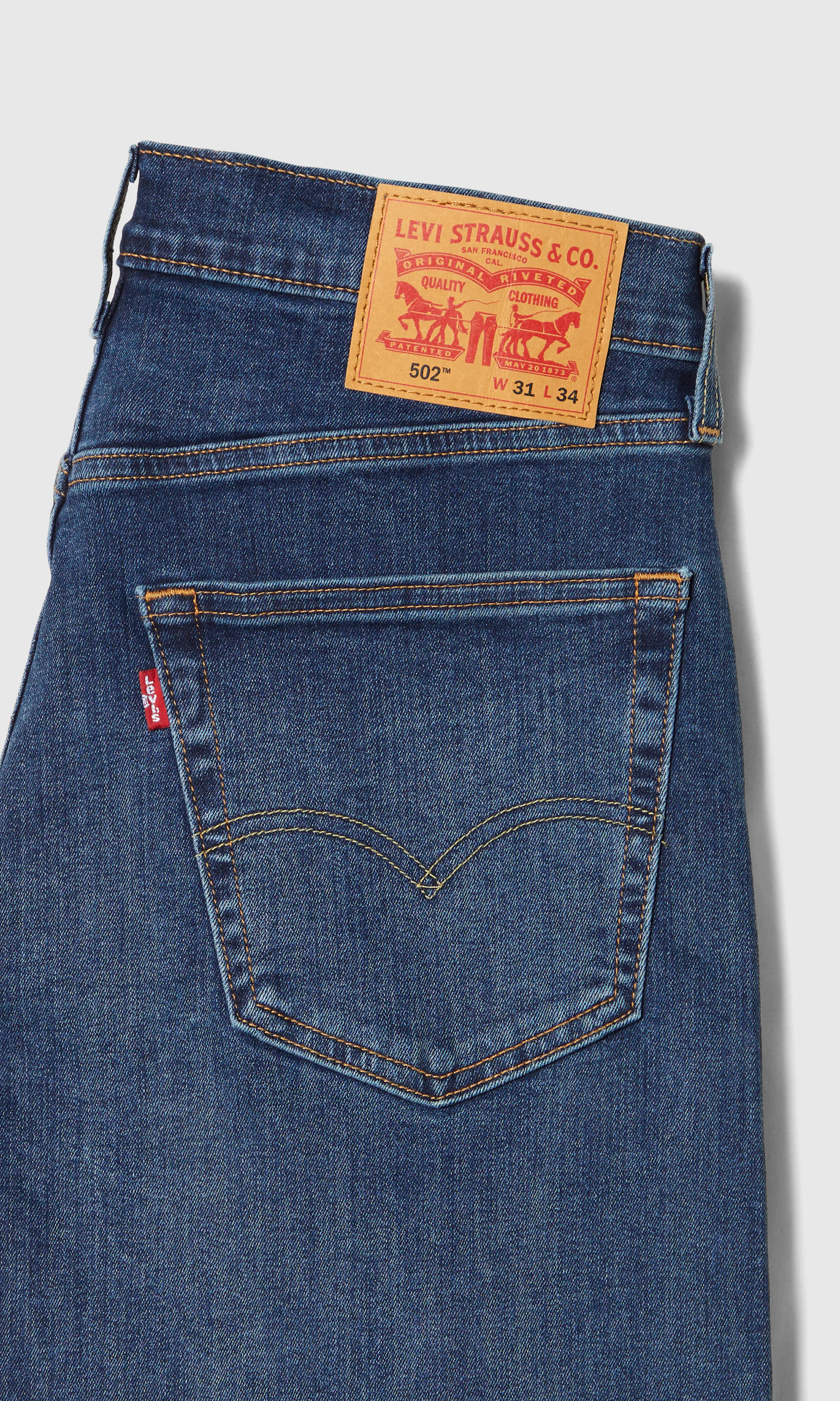 502™ Taper Jeans. Detail 1. Flat.