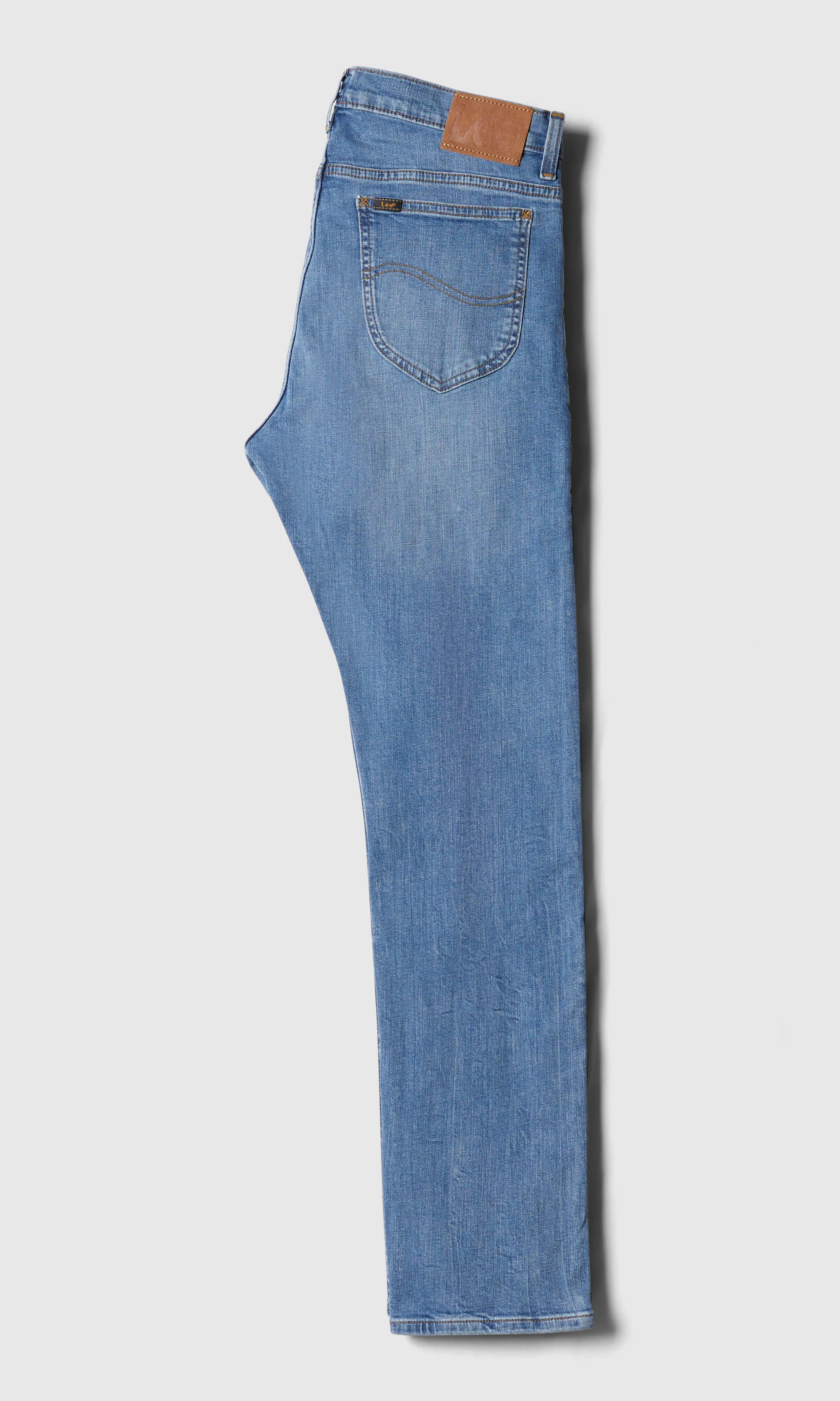 Rider Medium Blå Jeans. Back. Flat.