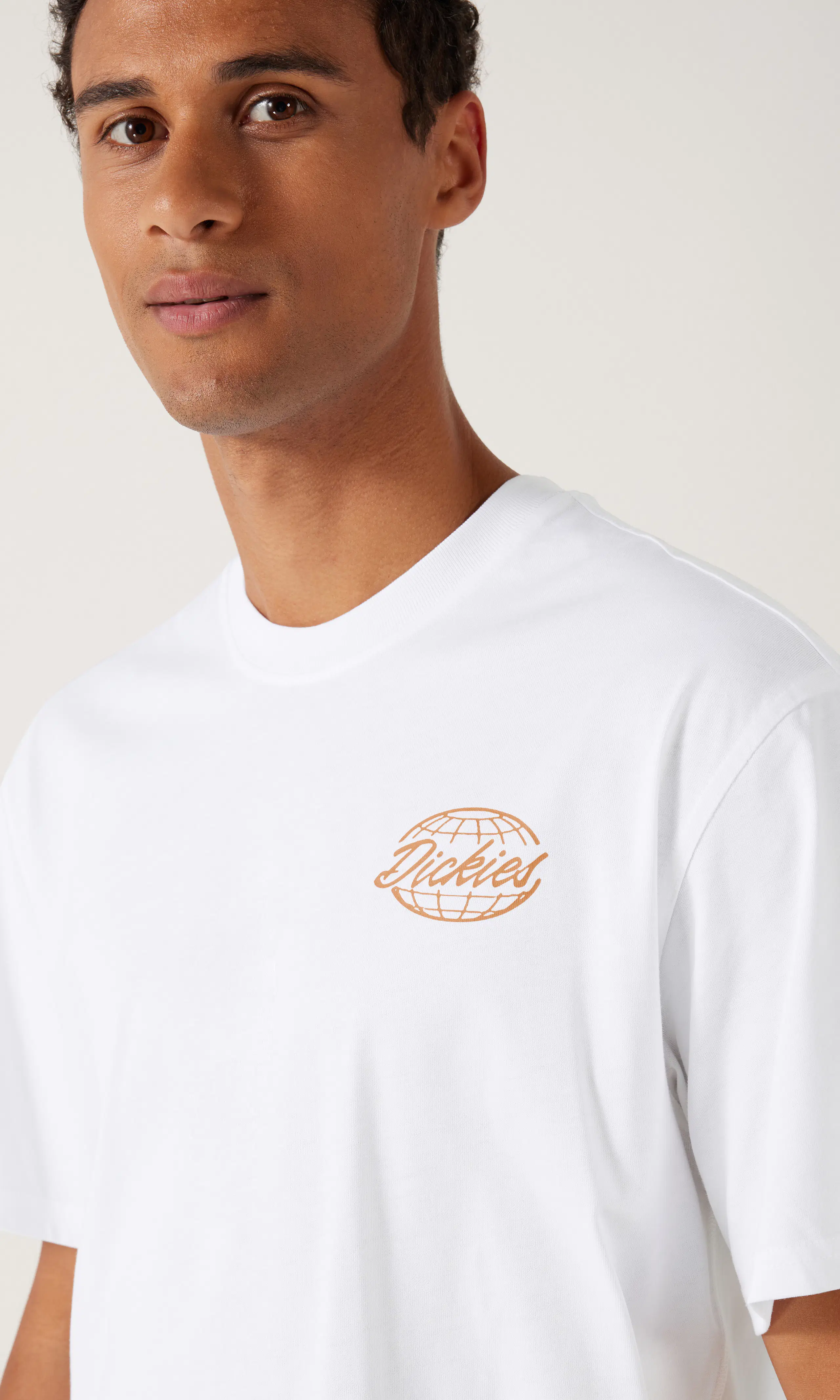 Globe Off White T-Shirt. Detail 1. Model.