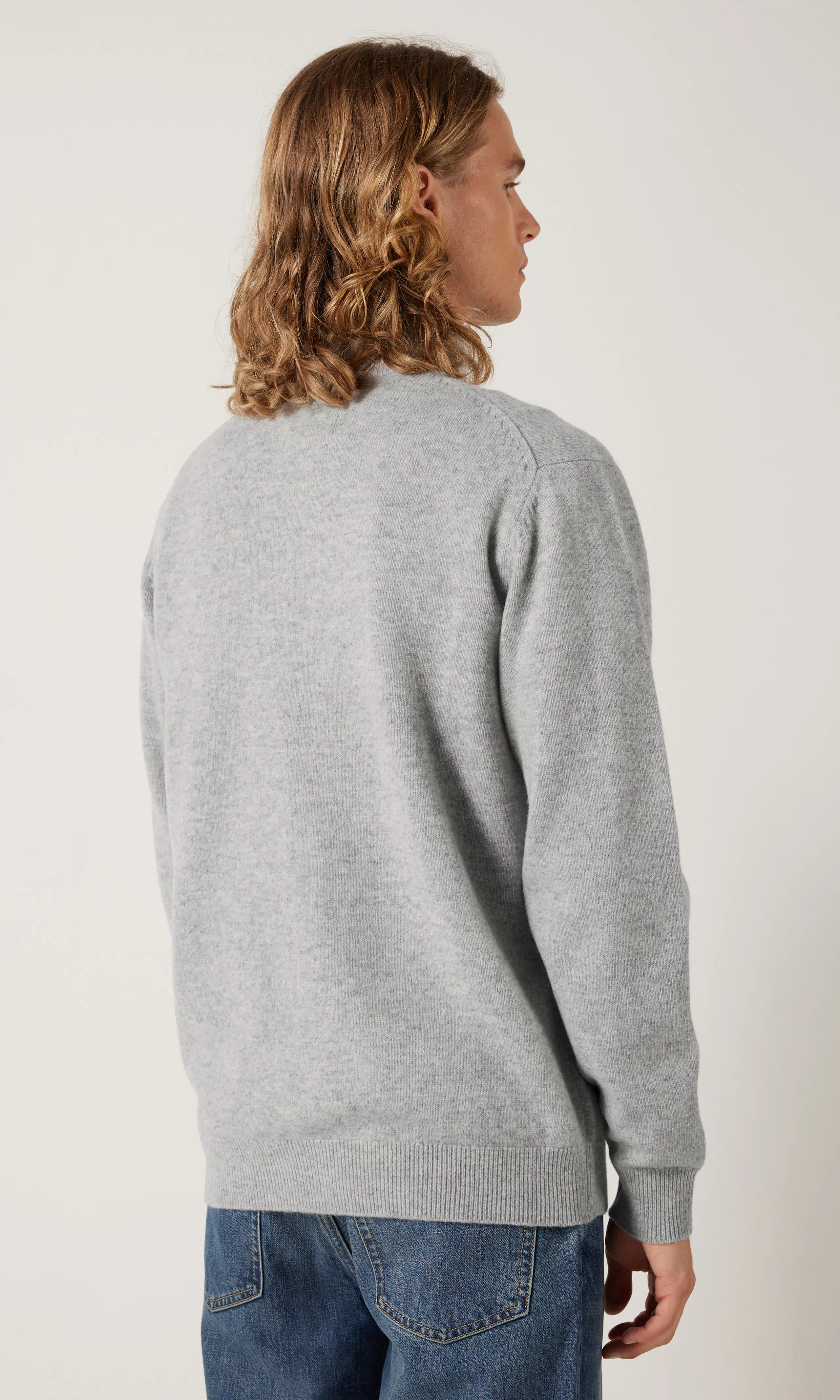 Merino Half Zip Tröja. Back. Model.