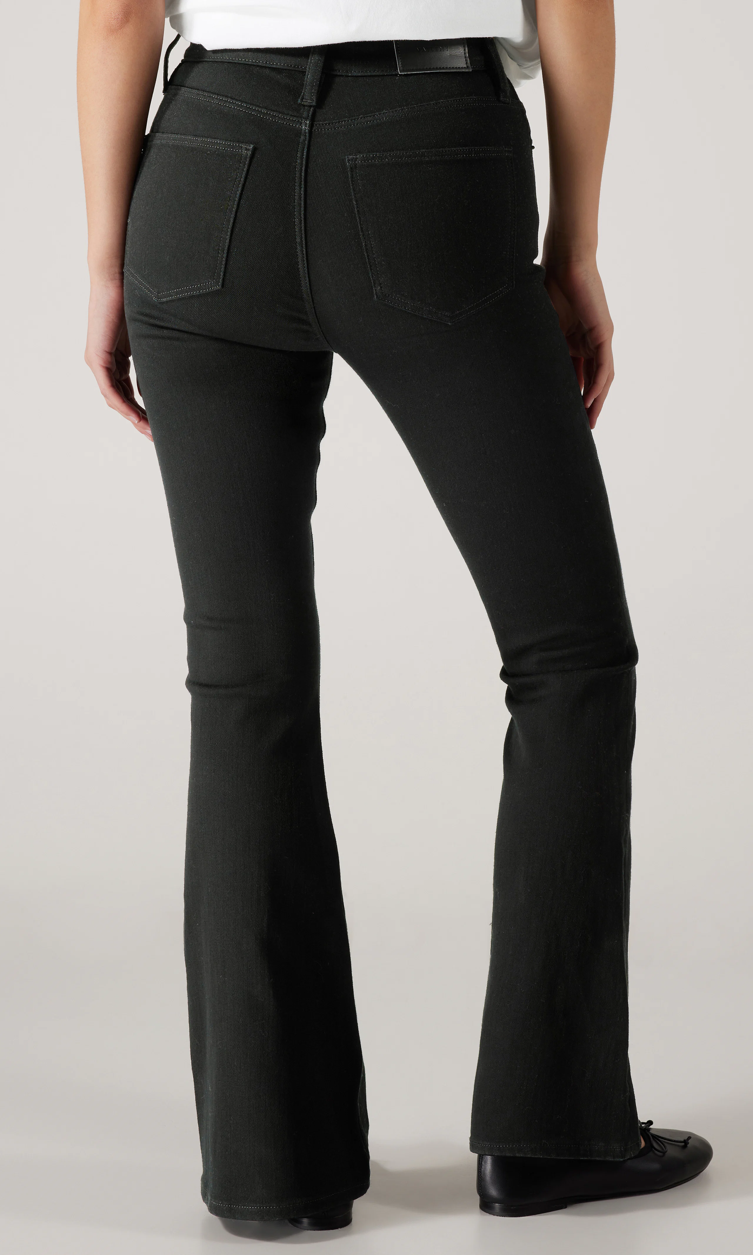 Flare Jeans. Back. Model.