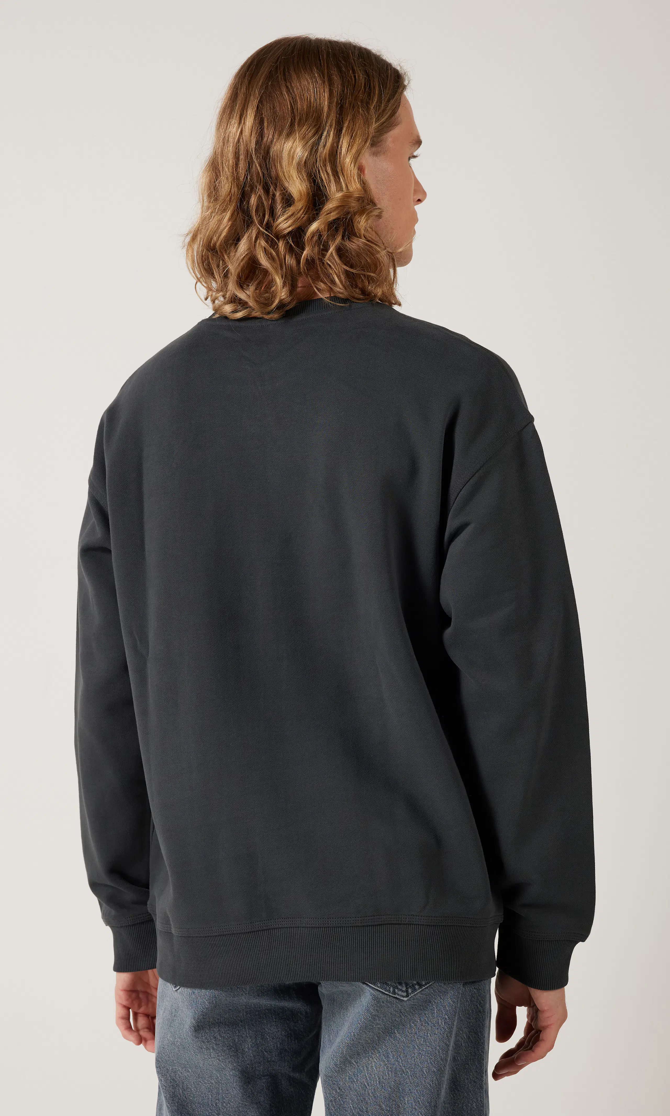 Workwear Svart Tröja. Back. Model.
