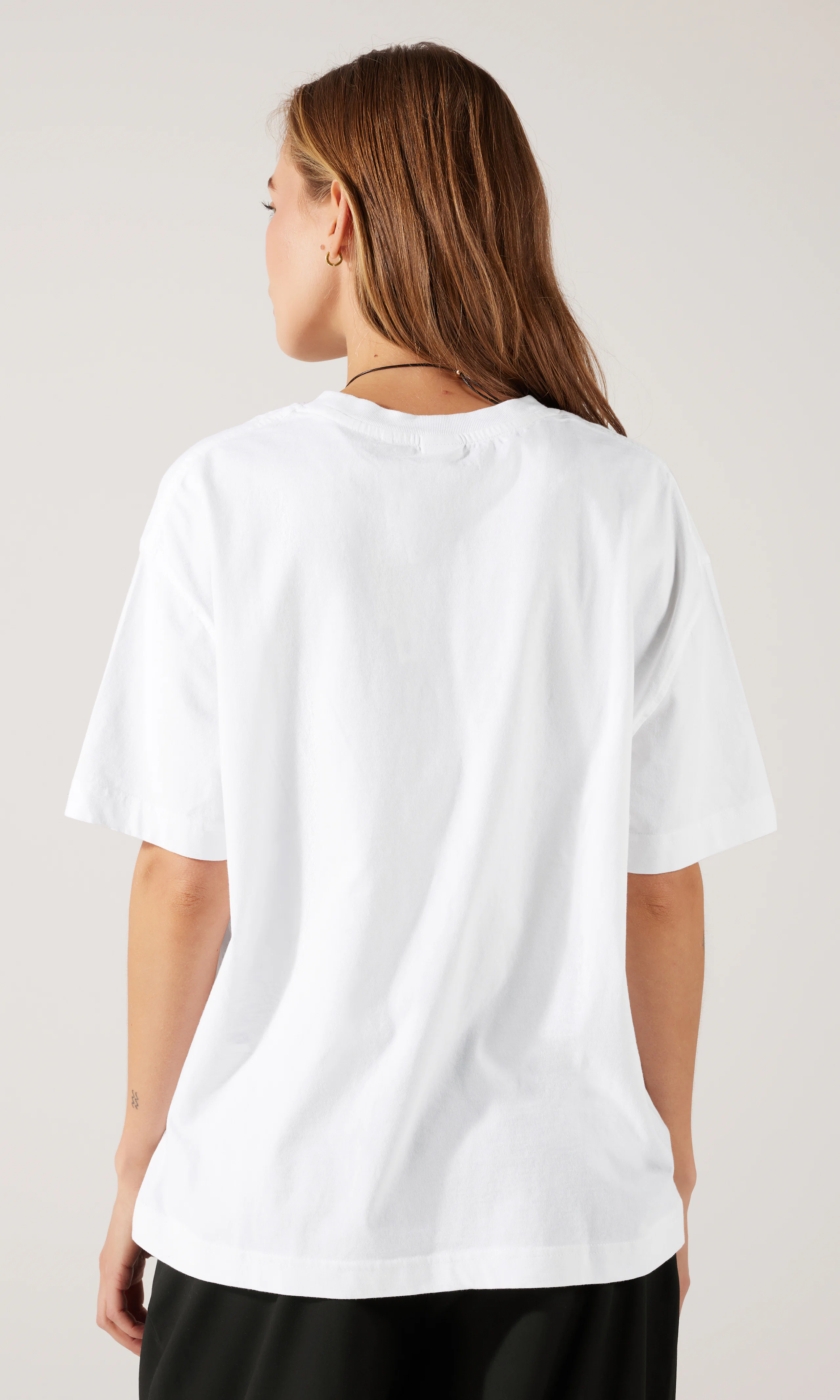 Loose T-Shirt. Back. Model.