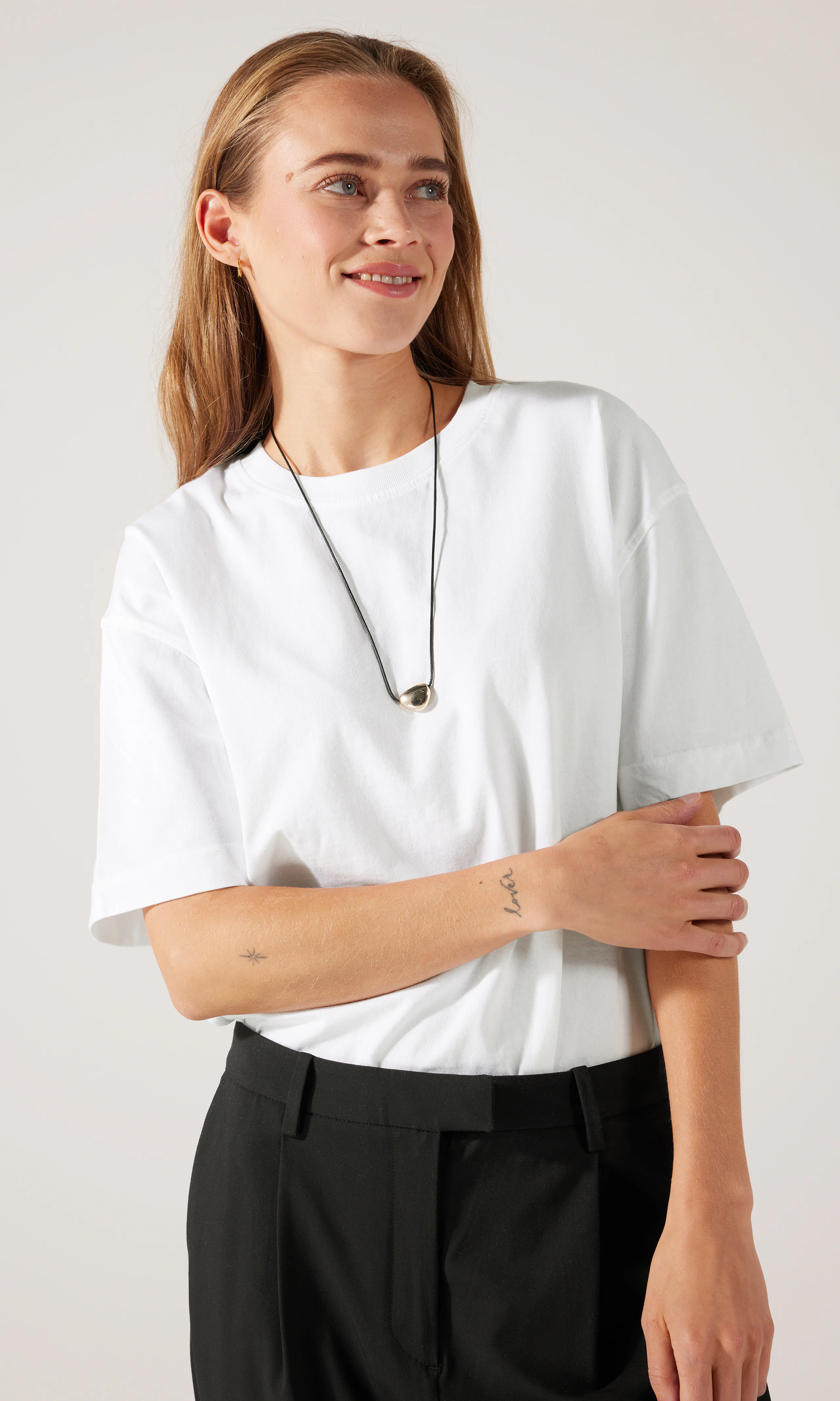 Loose T-Shirt. Front. Model.