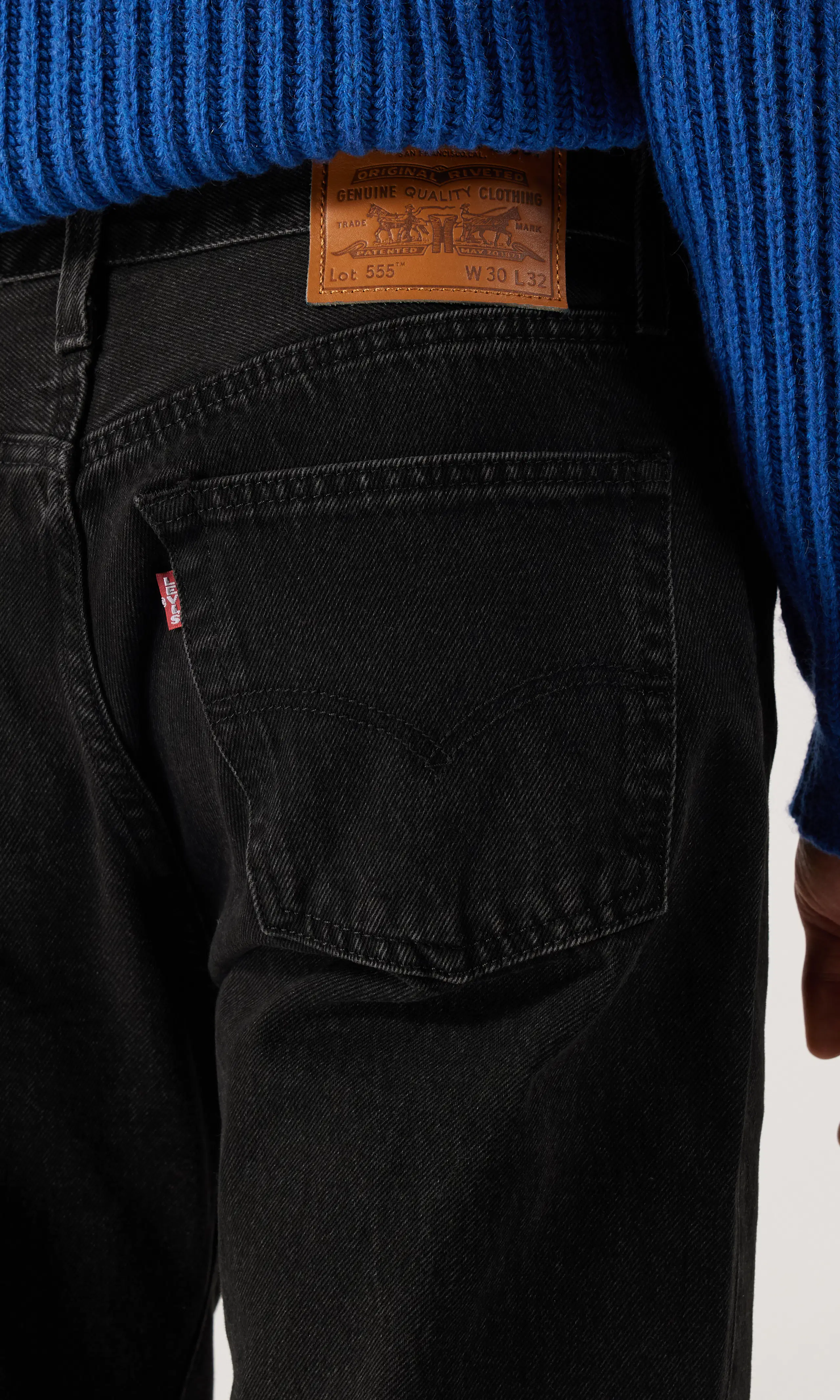 555™ Relaxed Straight Jeans. Detail 1. Model.