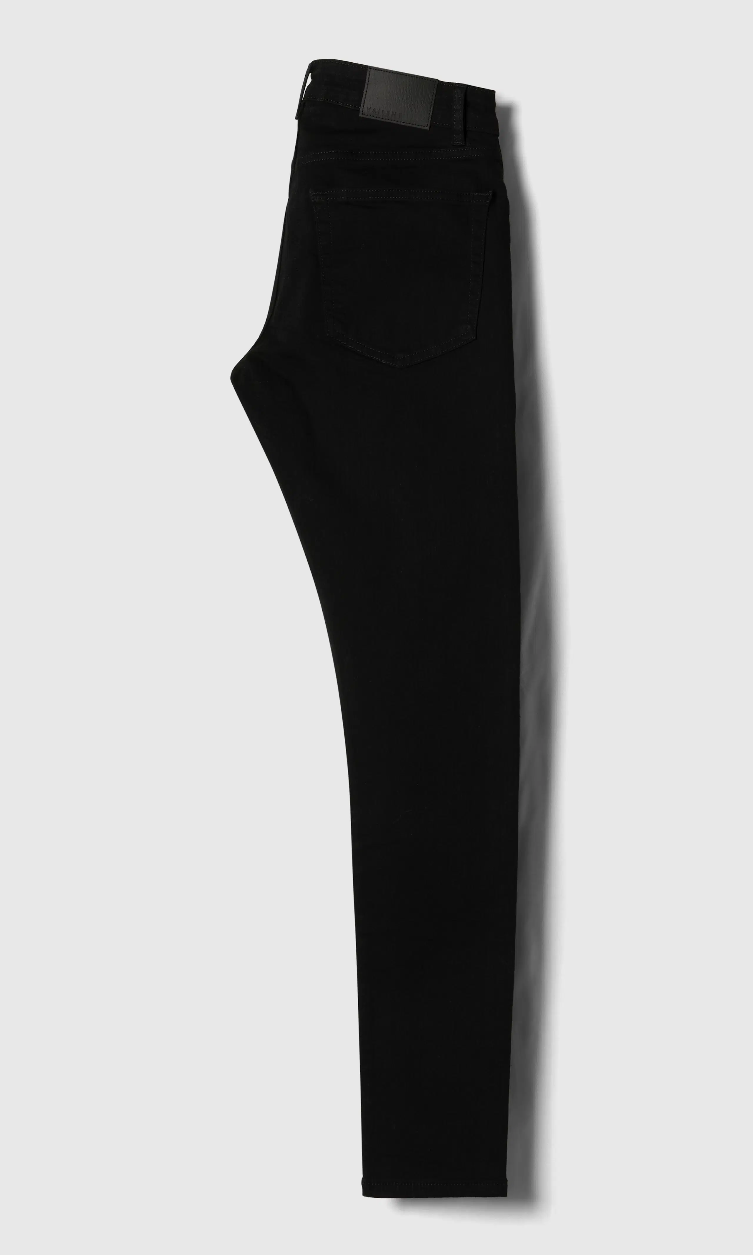 Skinny Mustat Farkut. Back. Flat.