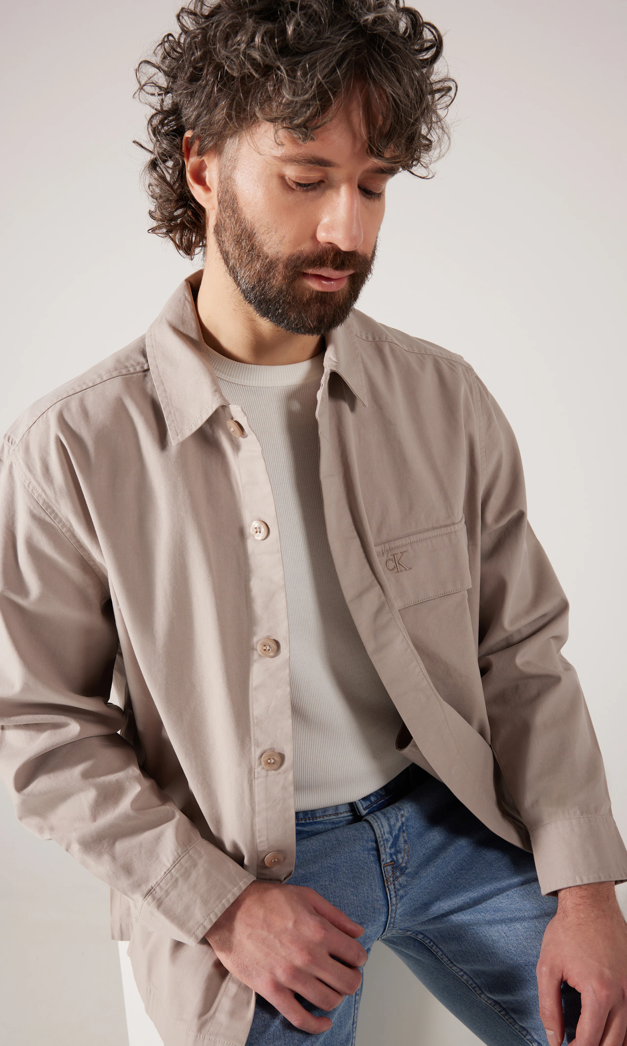 Clean Cotton Beige Overshirt. Front. Model.
