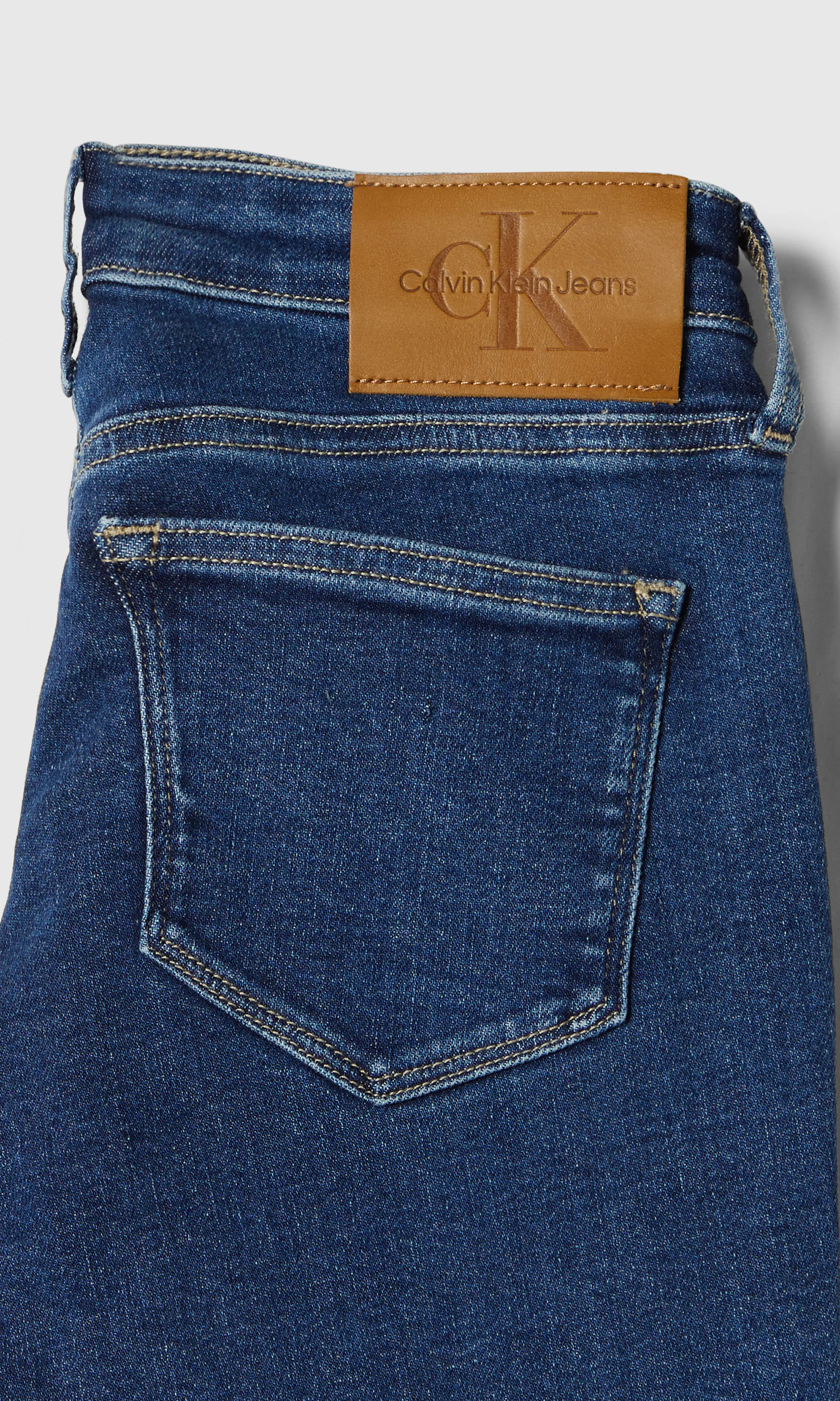 Mid Rise Skinny Medium Blå Jeans. Detail 1. Flat.