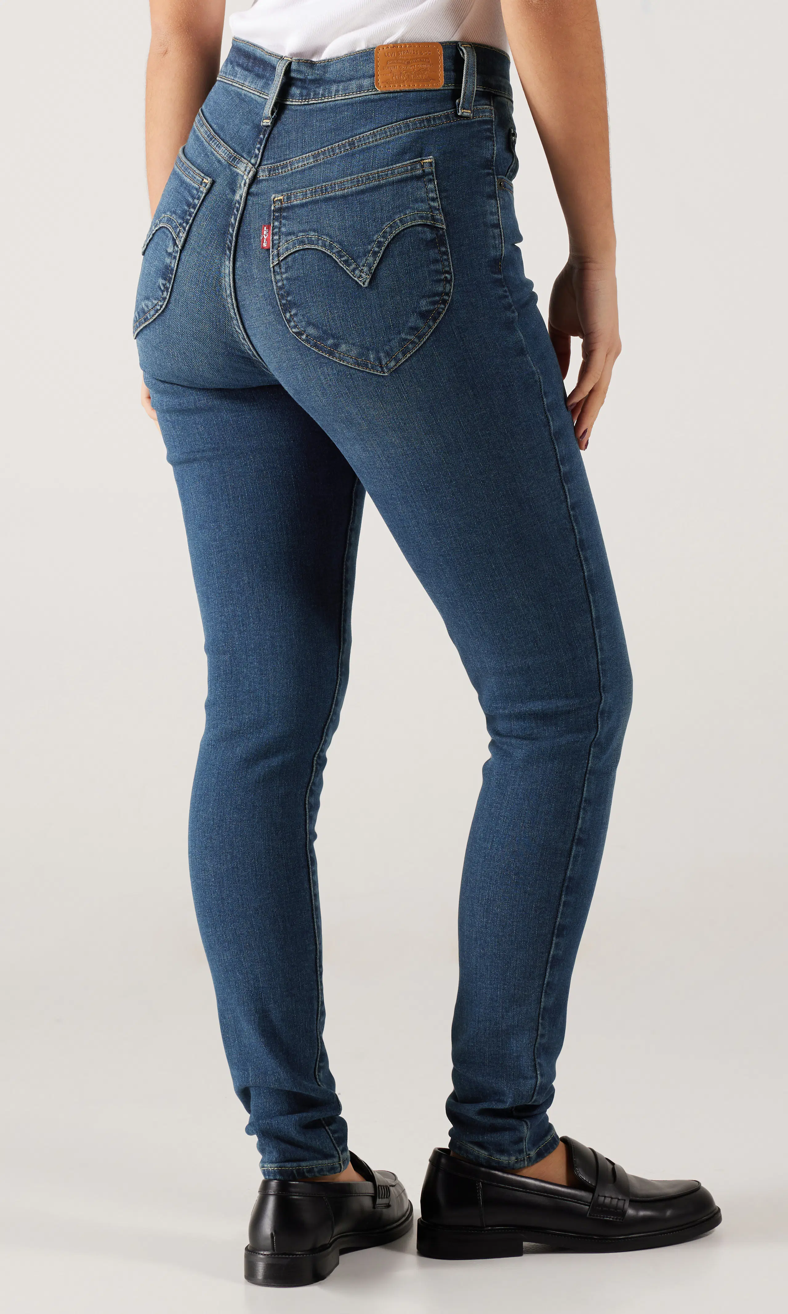 Retro High Skinny Mørk Blå Jeans. Back. Model.