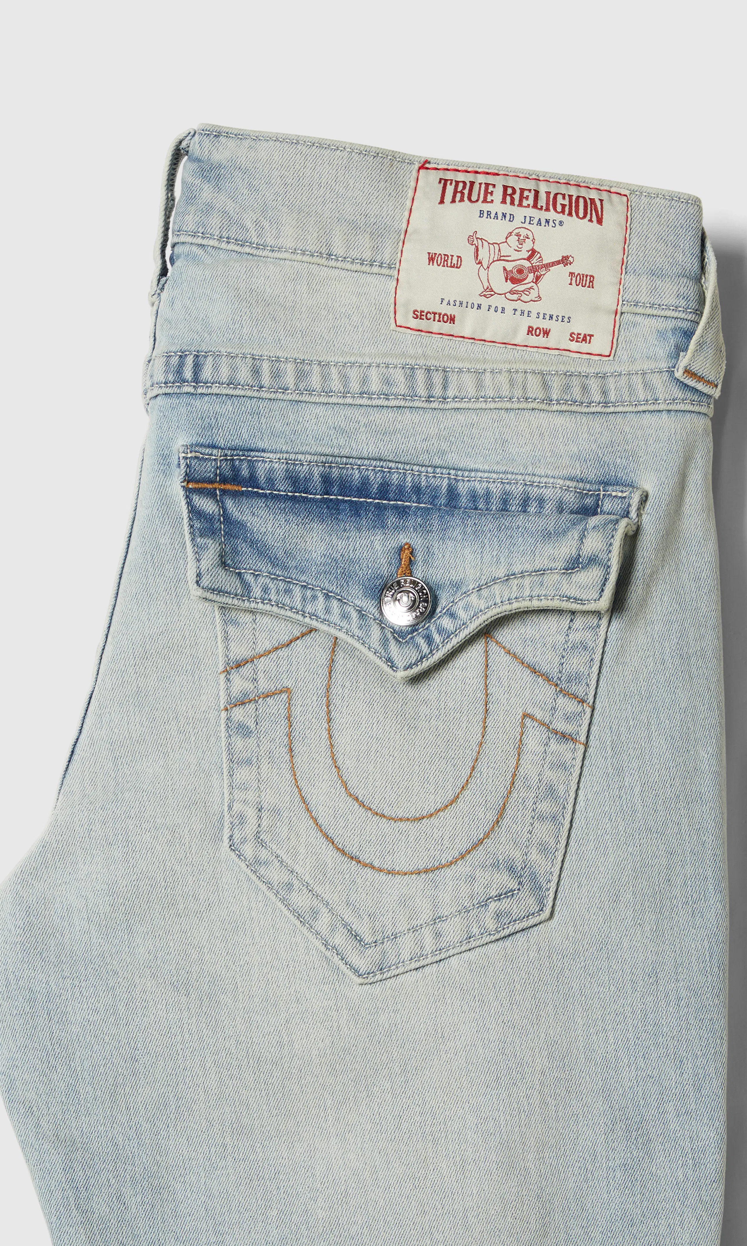 Rocco Flap Ljusblå Jeans. Detail 1. Flat.