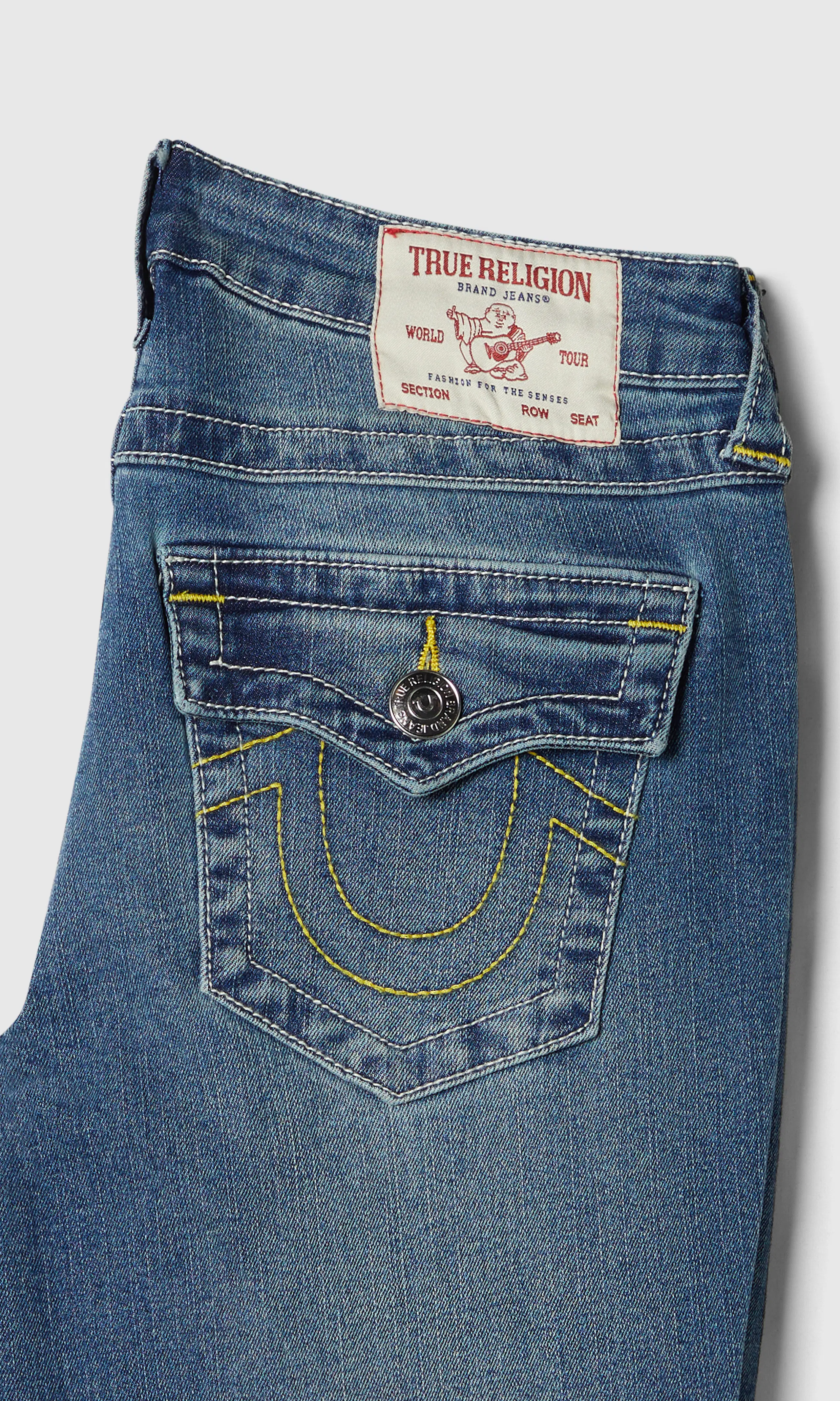 Becca Mid Rise Boot Medium Blå Jeans. Detail 1. Flat.