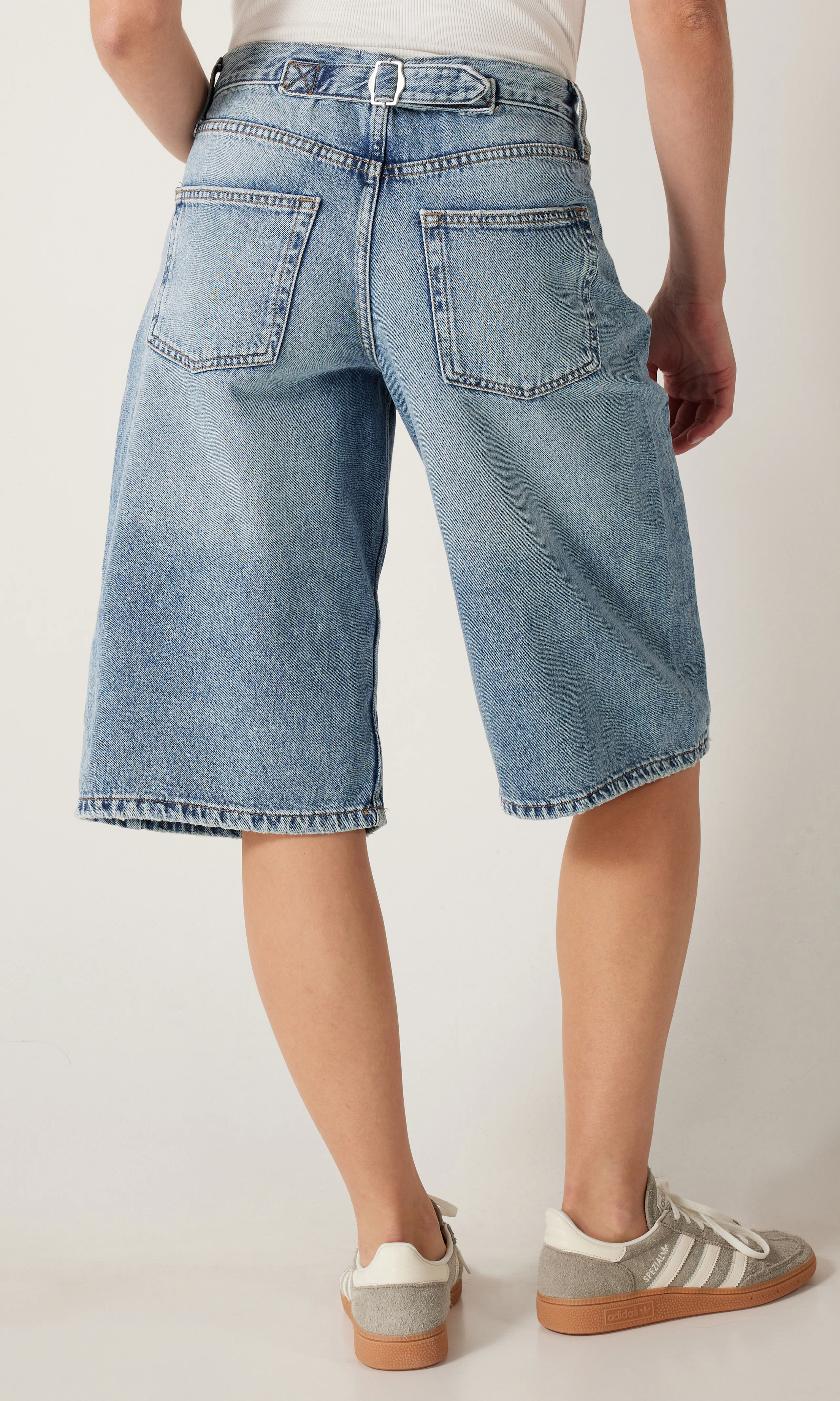 Logan Mid Blue Shorts. Back. Model.