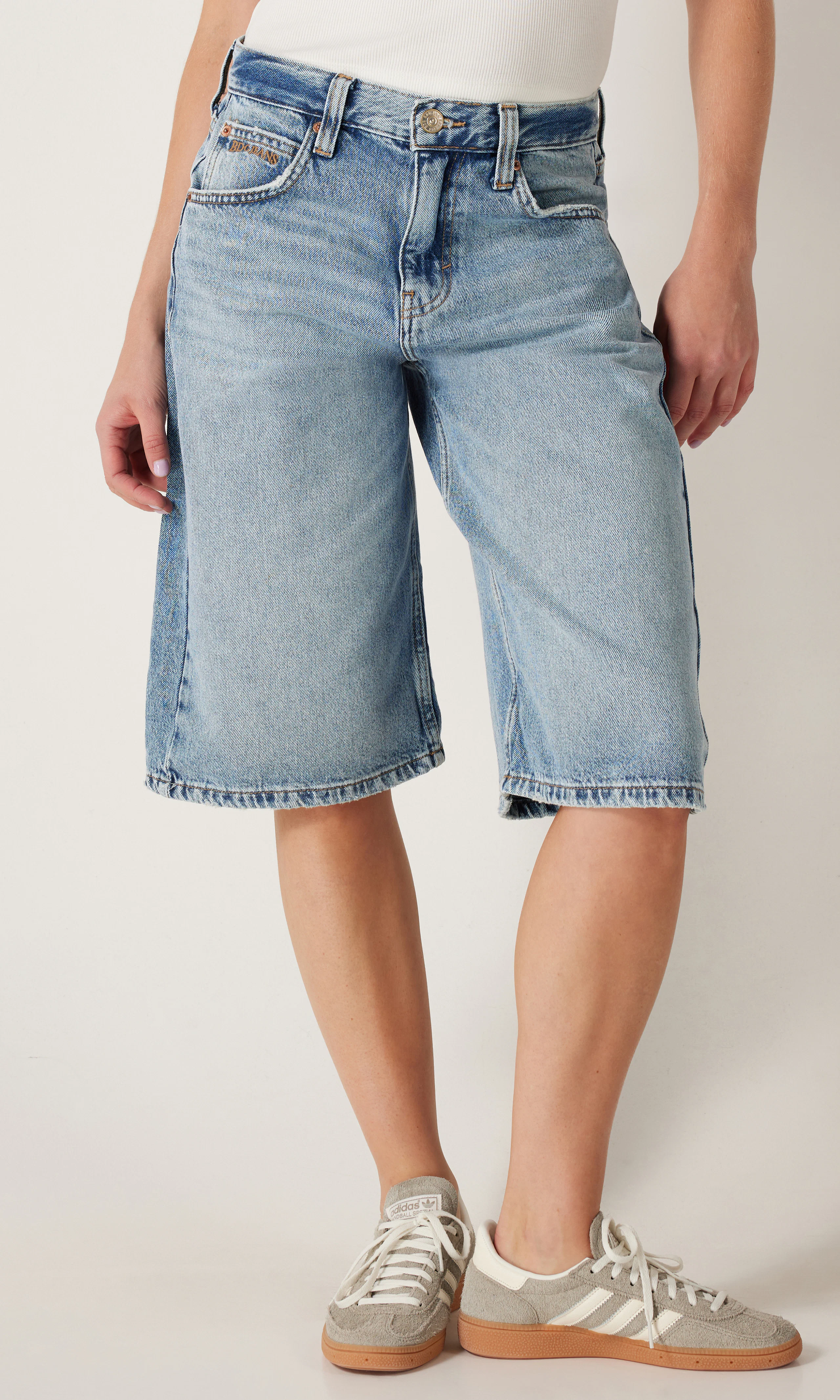 Logan Mid Blue Shorts. Front. Model.