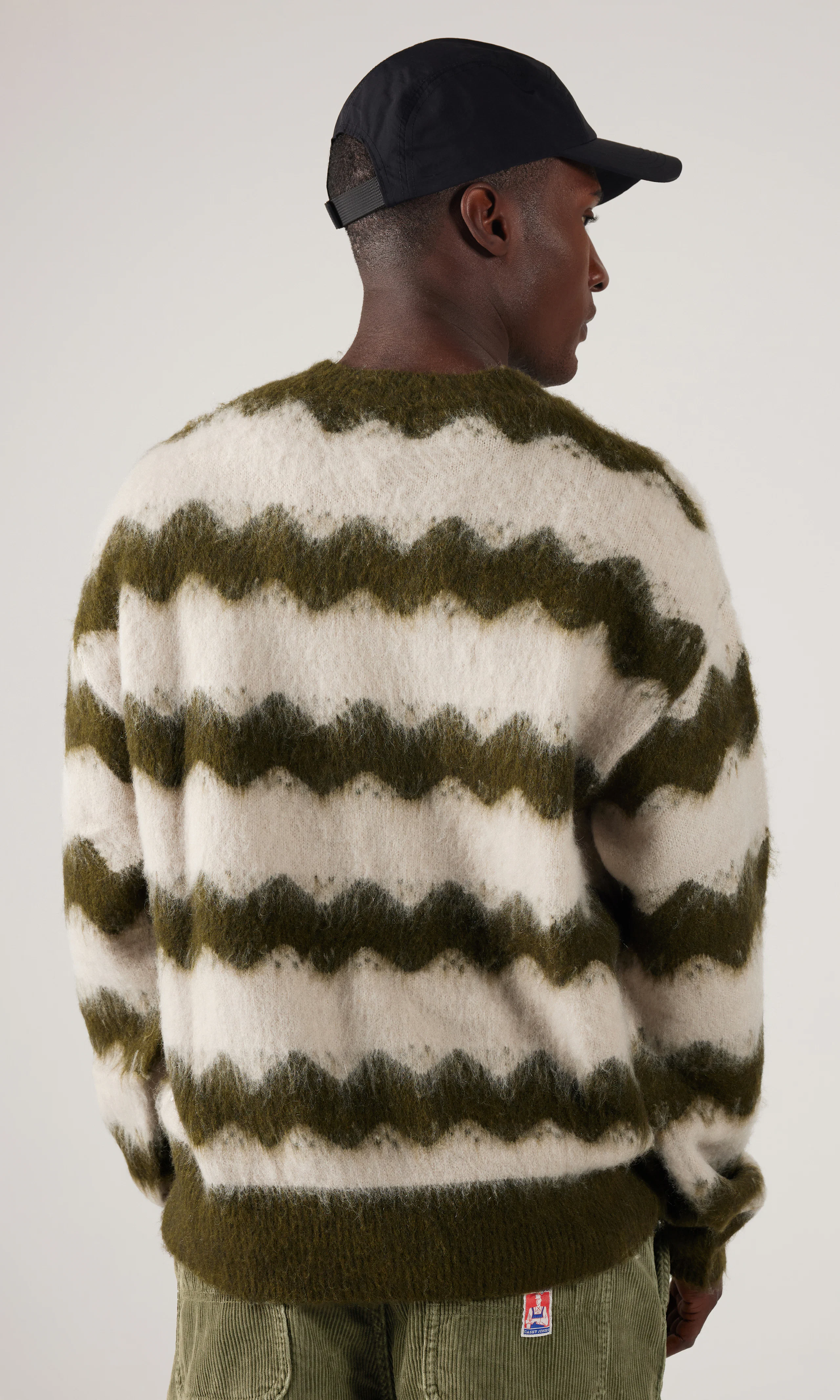 Striped Neule. Back. Model.