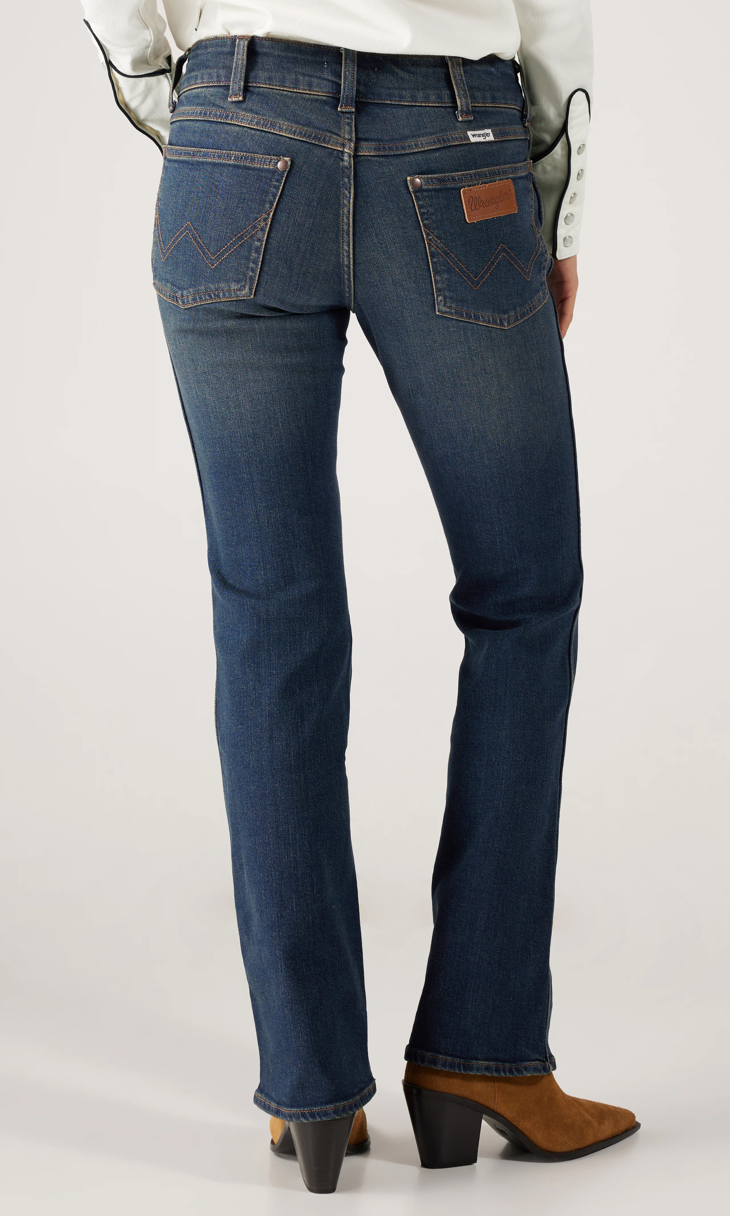 Low Rise Bold Boot Jeans. Back. Model.