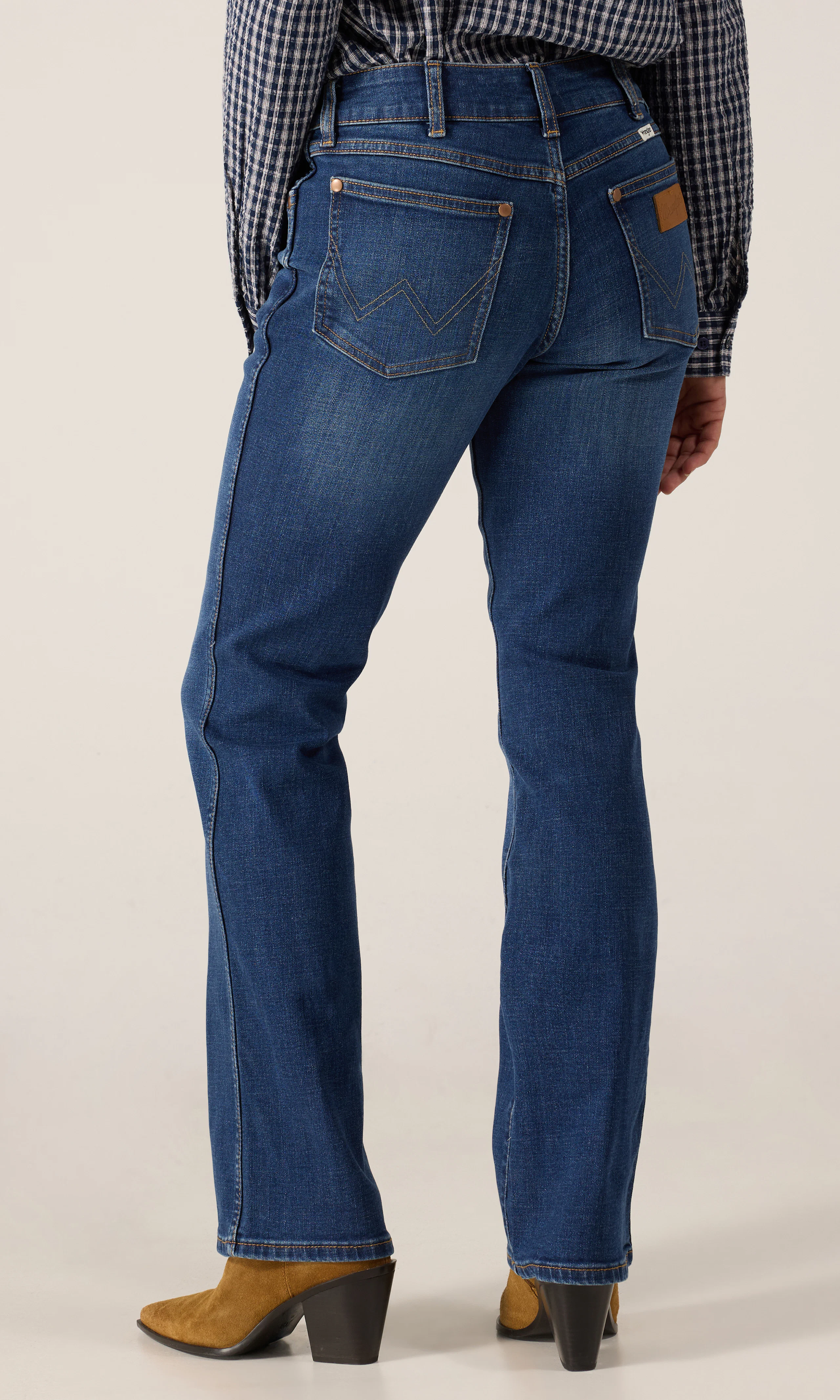 Low Rise Bold Boot Jeans. Back. Model.