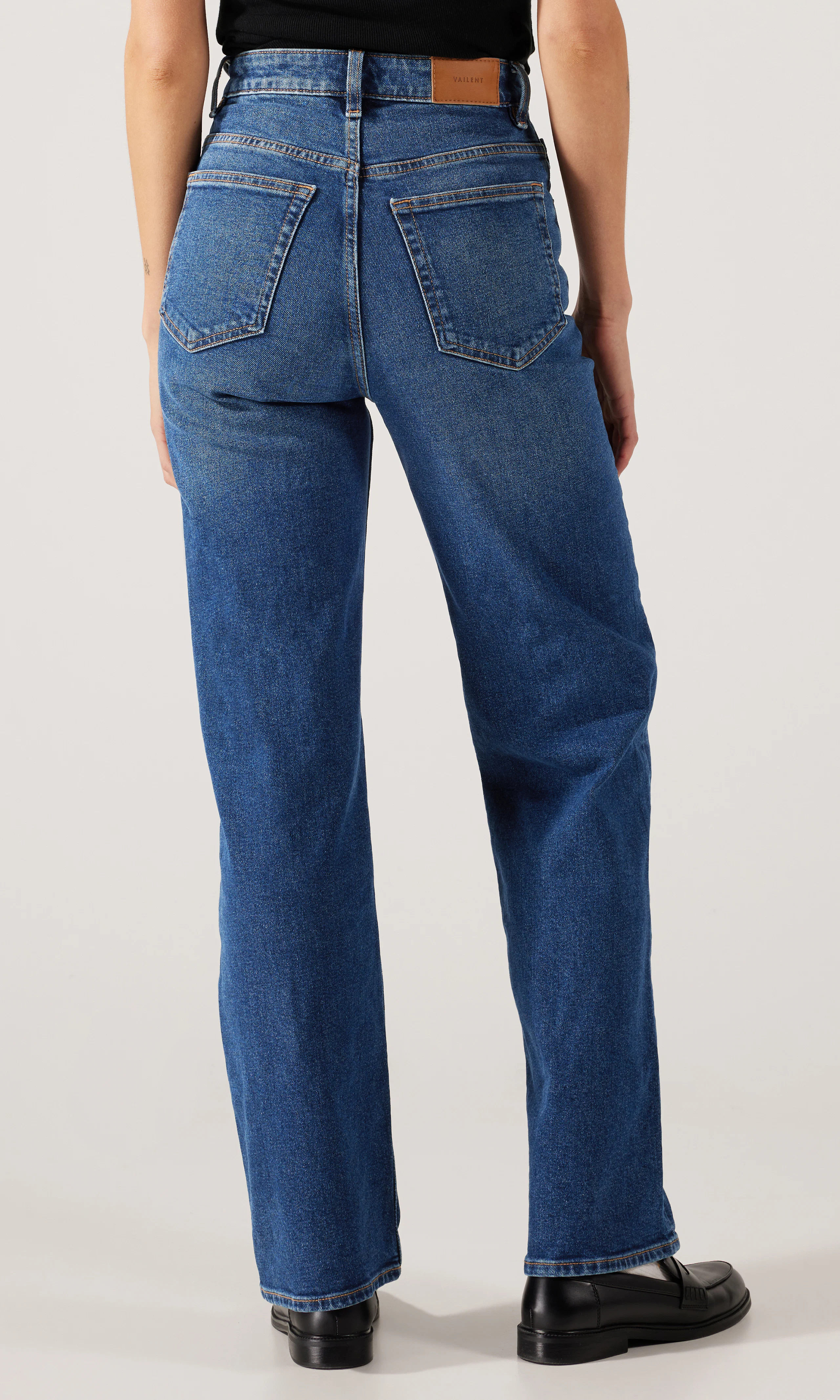 Straight Jeans. Back. Model.