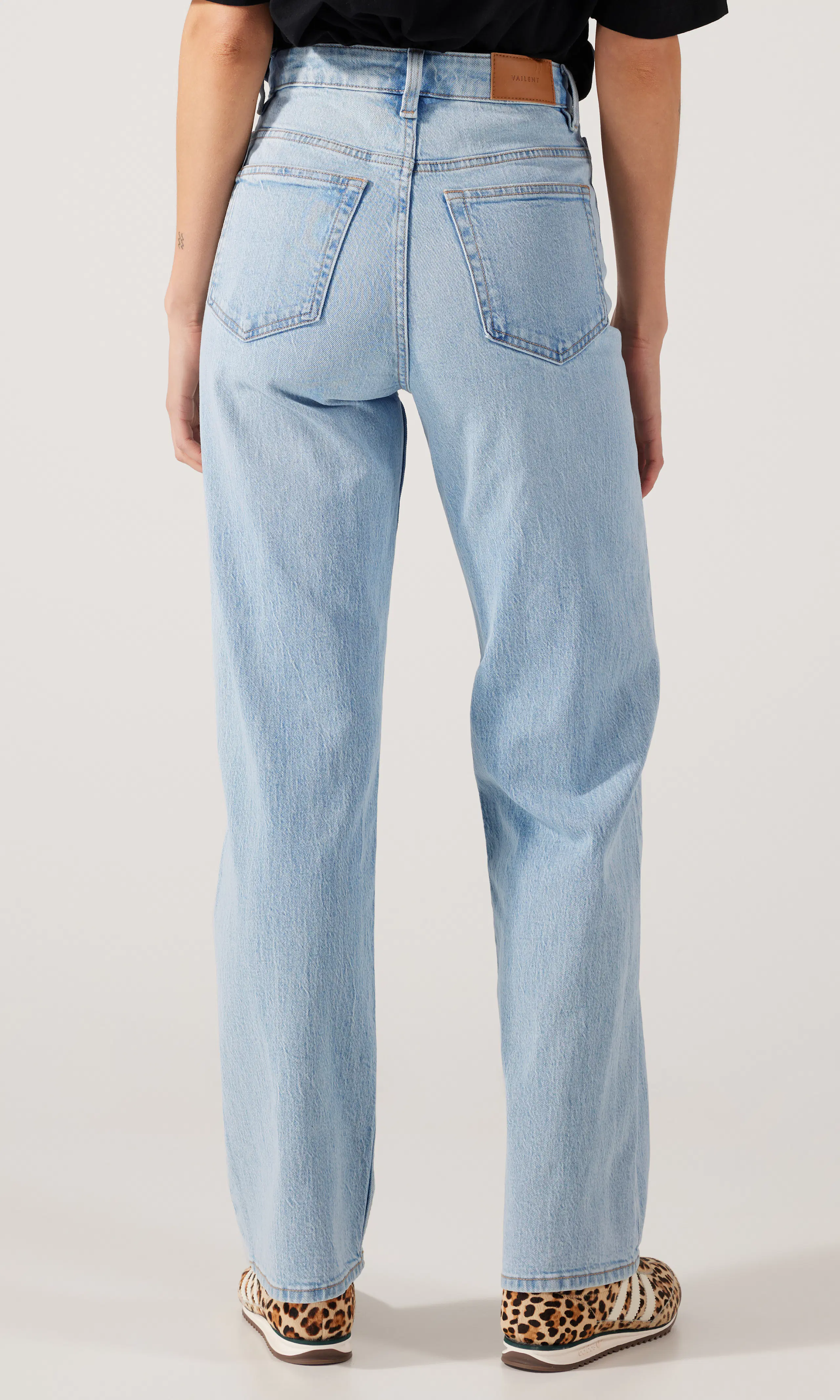 Straight Jeans. Back. Model.