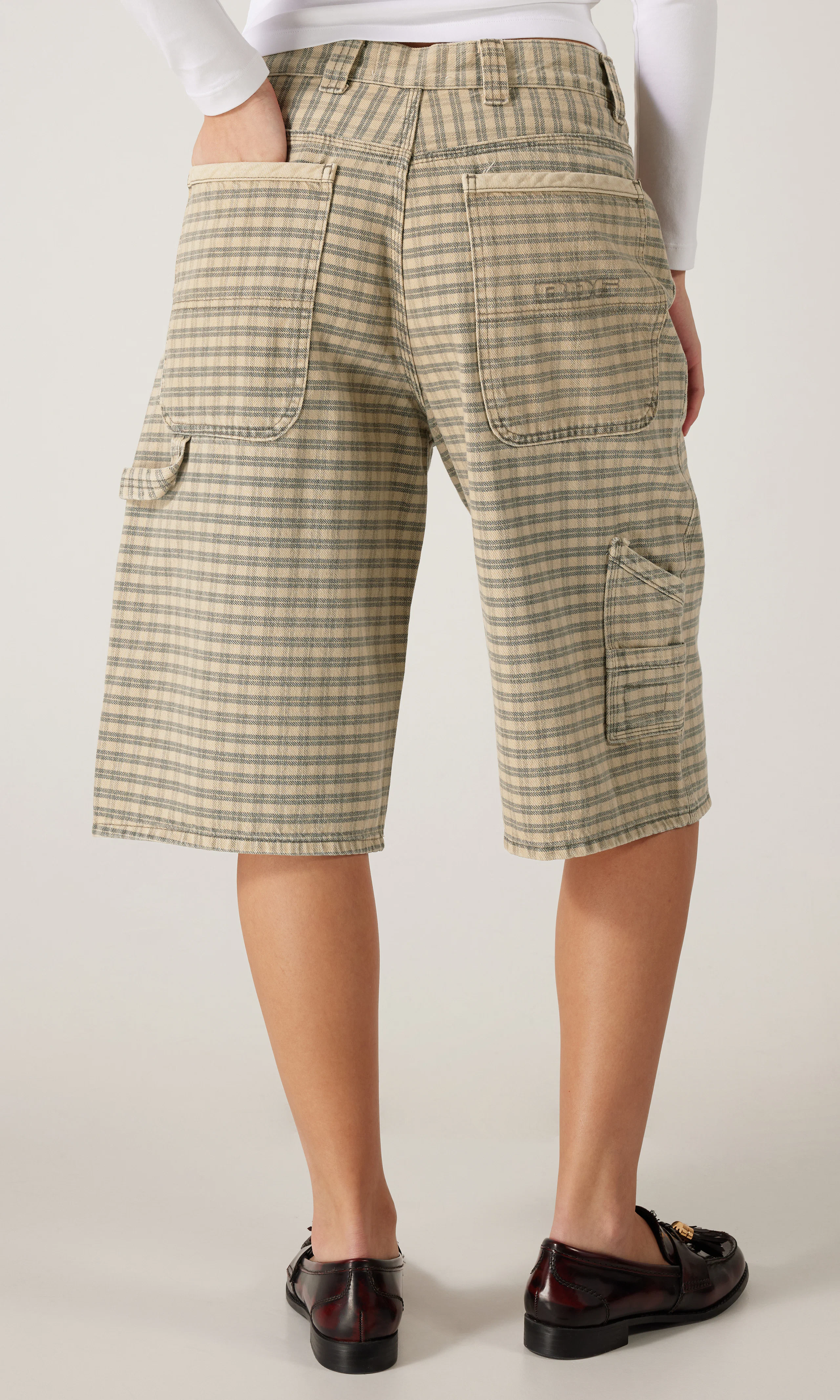 Nicola Beige Rutete Denim Shorts. Back. Model.