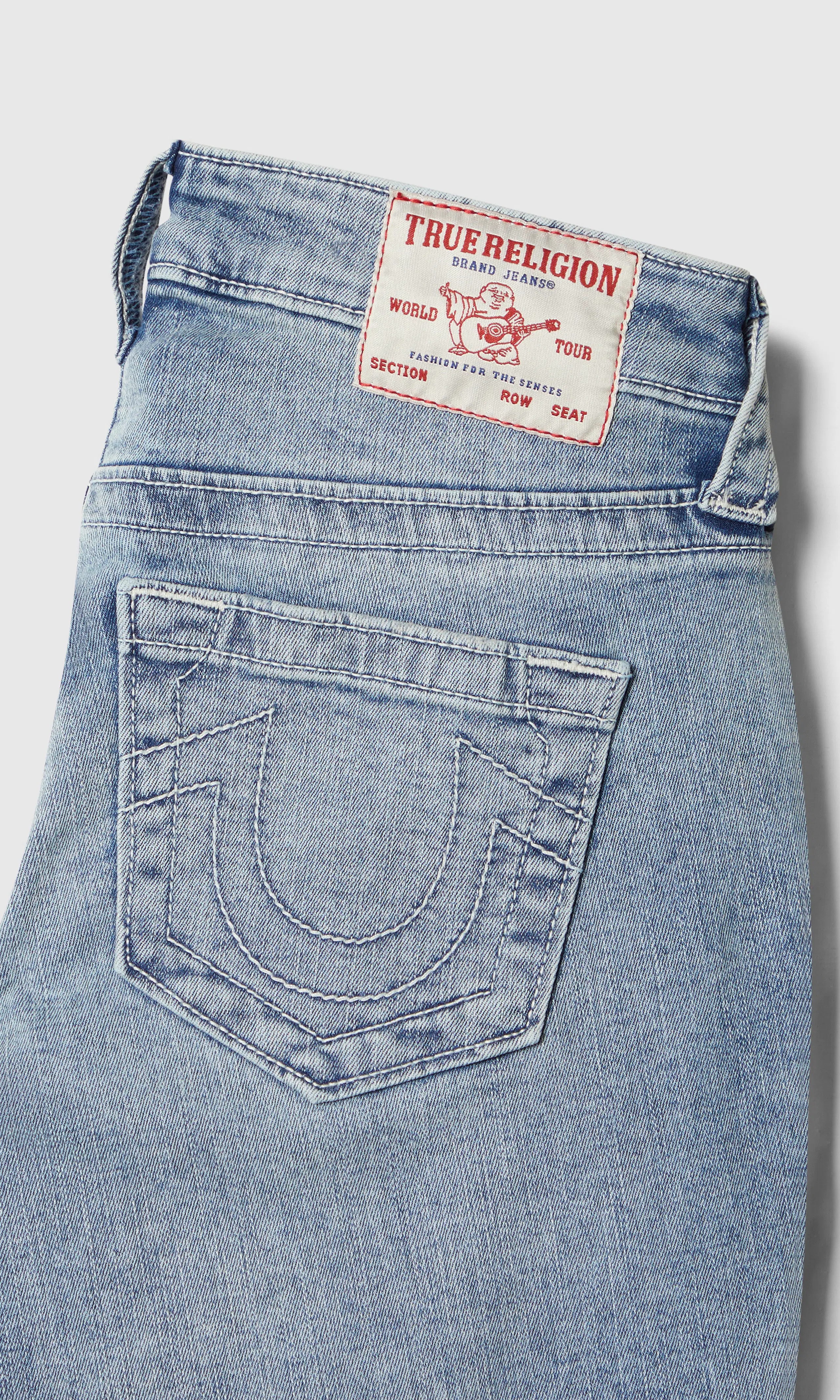 Jennie Mid Rise Curvy Skinny Ljusblå Jeans. Detail 1. Flat.
