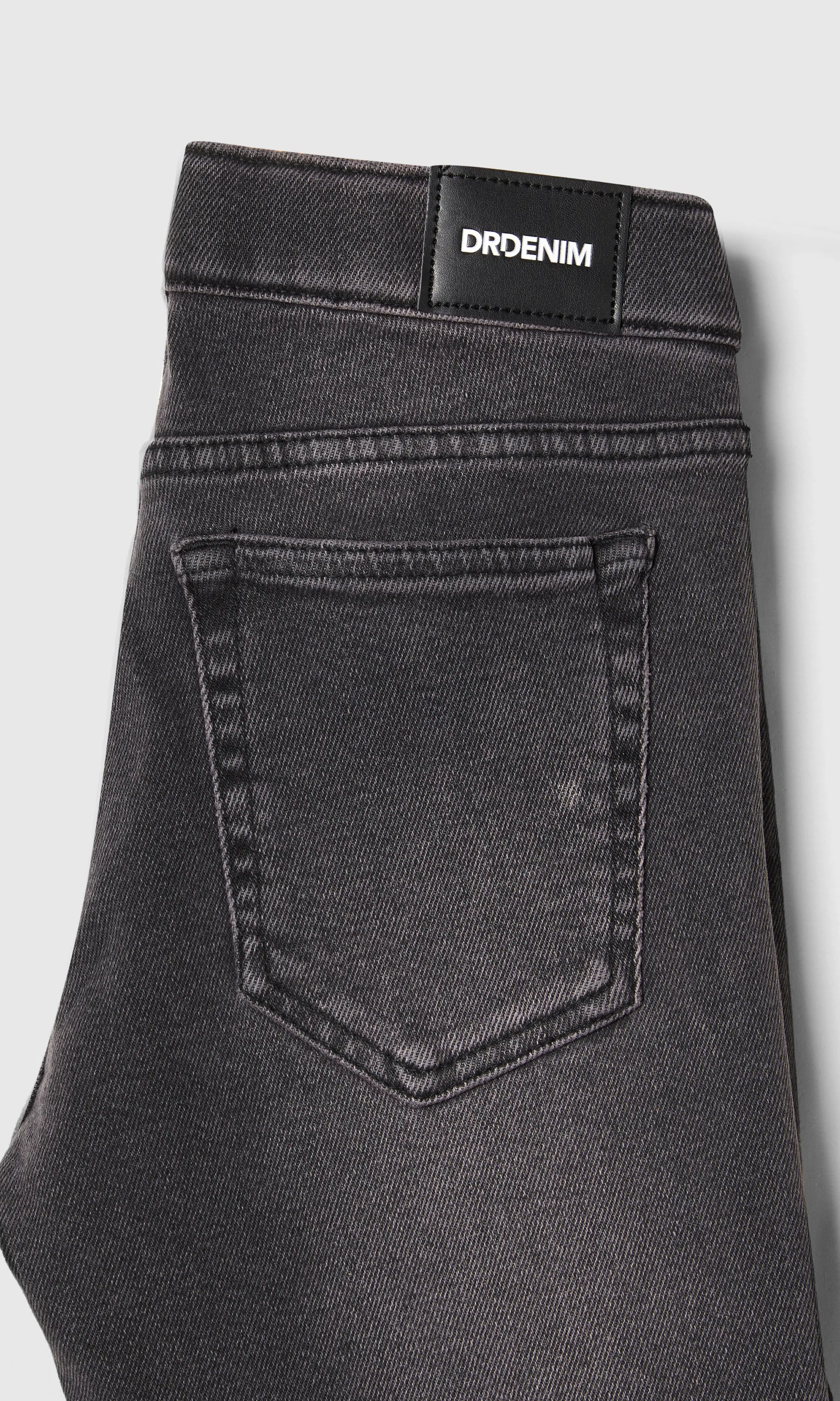Kily Low Bootcut Grå Jeans. Detail 1. Flat.