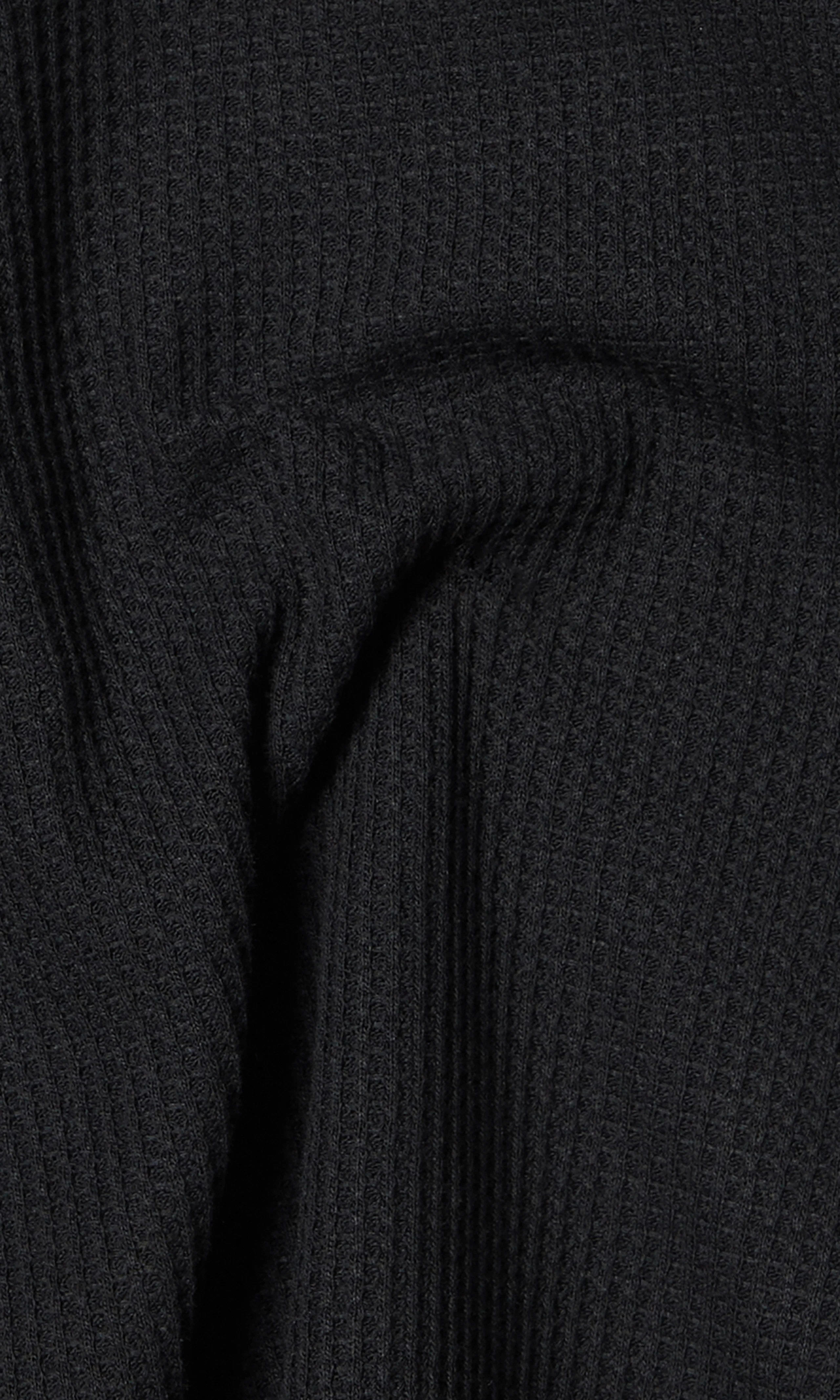 Waffle Long Sleeve Genser. Detail 2. Flat.