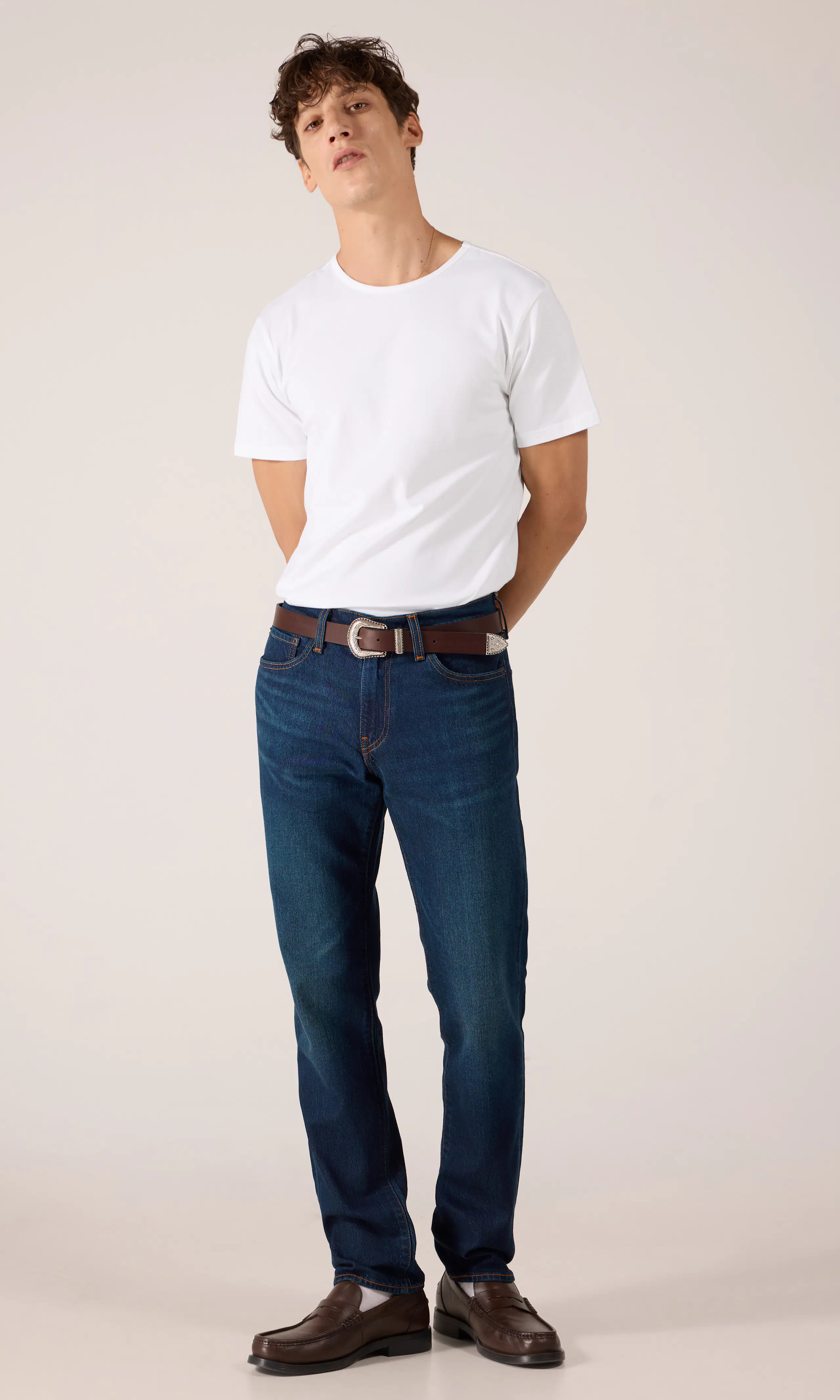 511™ Slim Jeans. Front 1. Model.