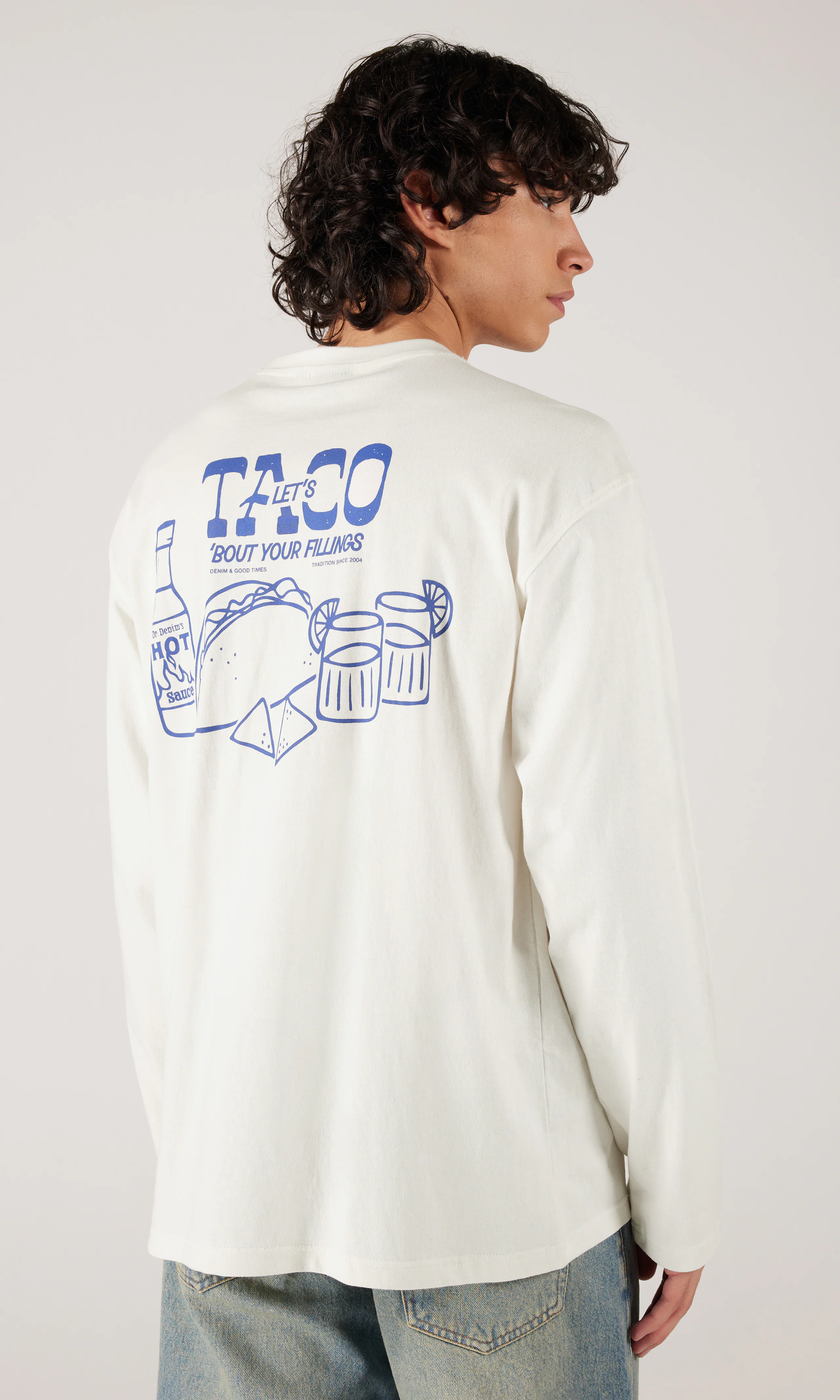 Caiden Off White Long Sleeve. Back. Model.