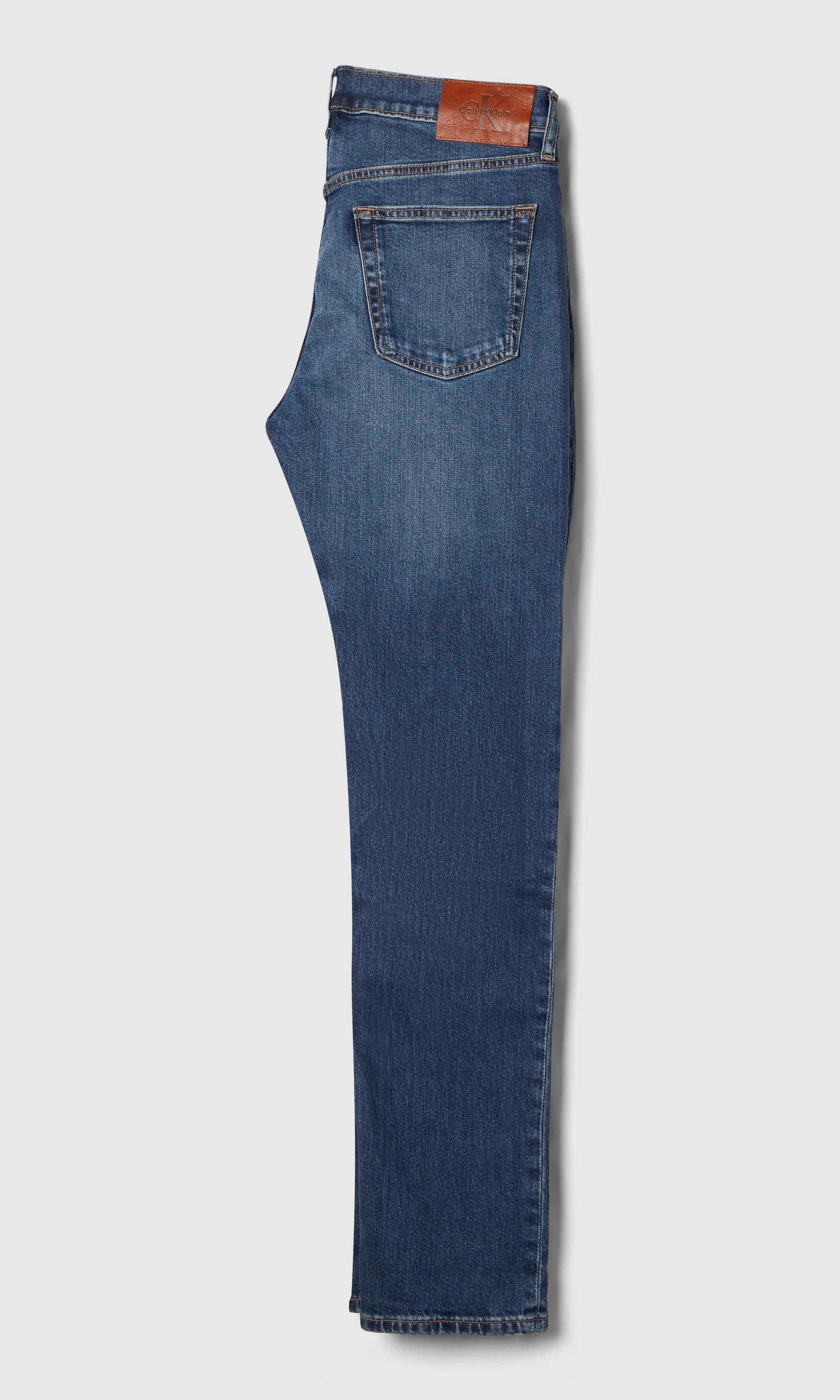 Slim Tapered Medium Blå Jeans. Back. Flat.