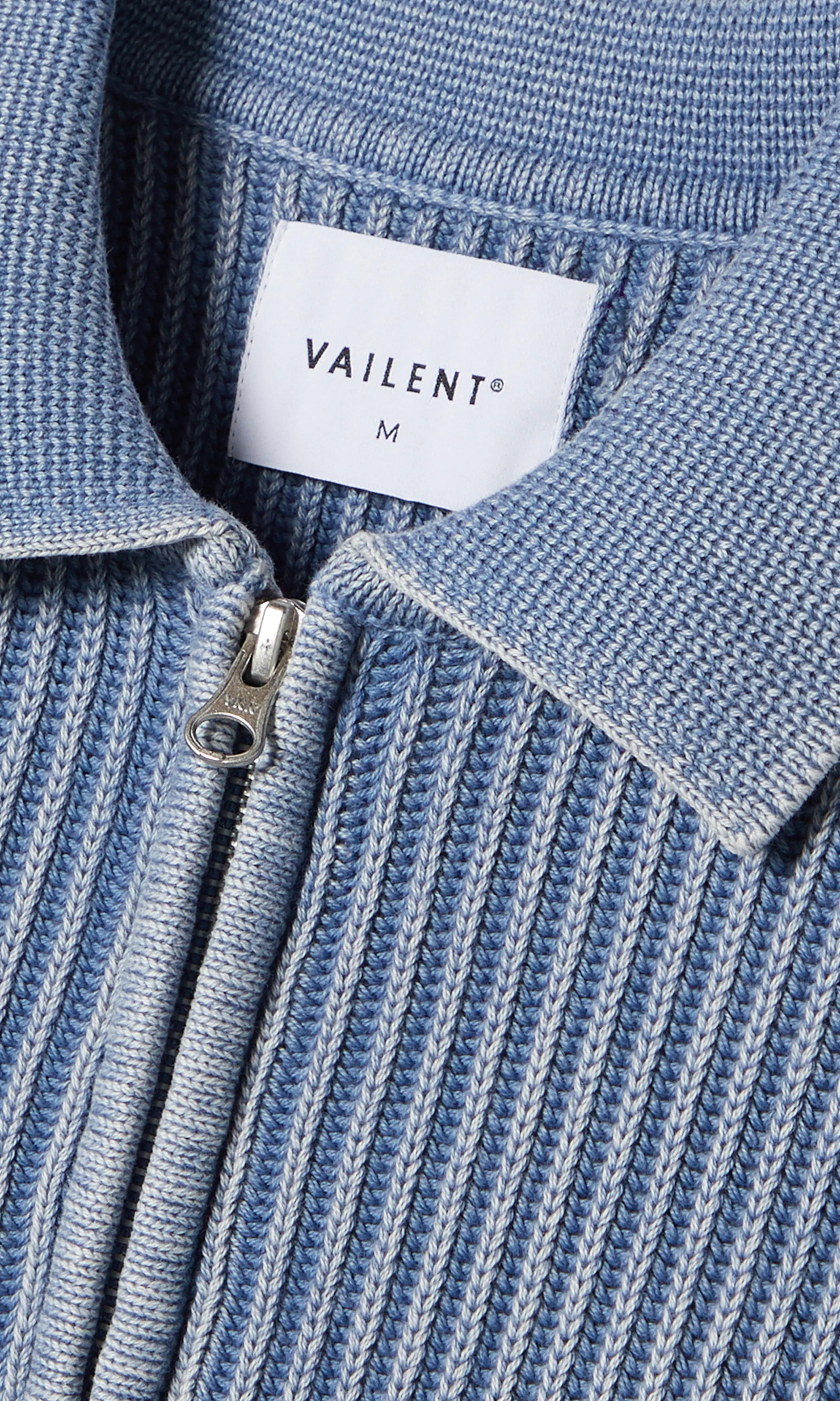 Spring Half Zip Polo Strikket Genser. Detail 1. Flat.