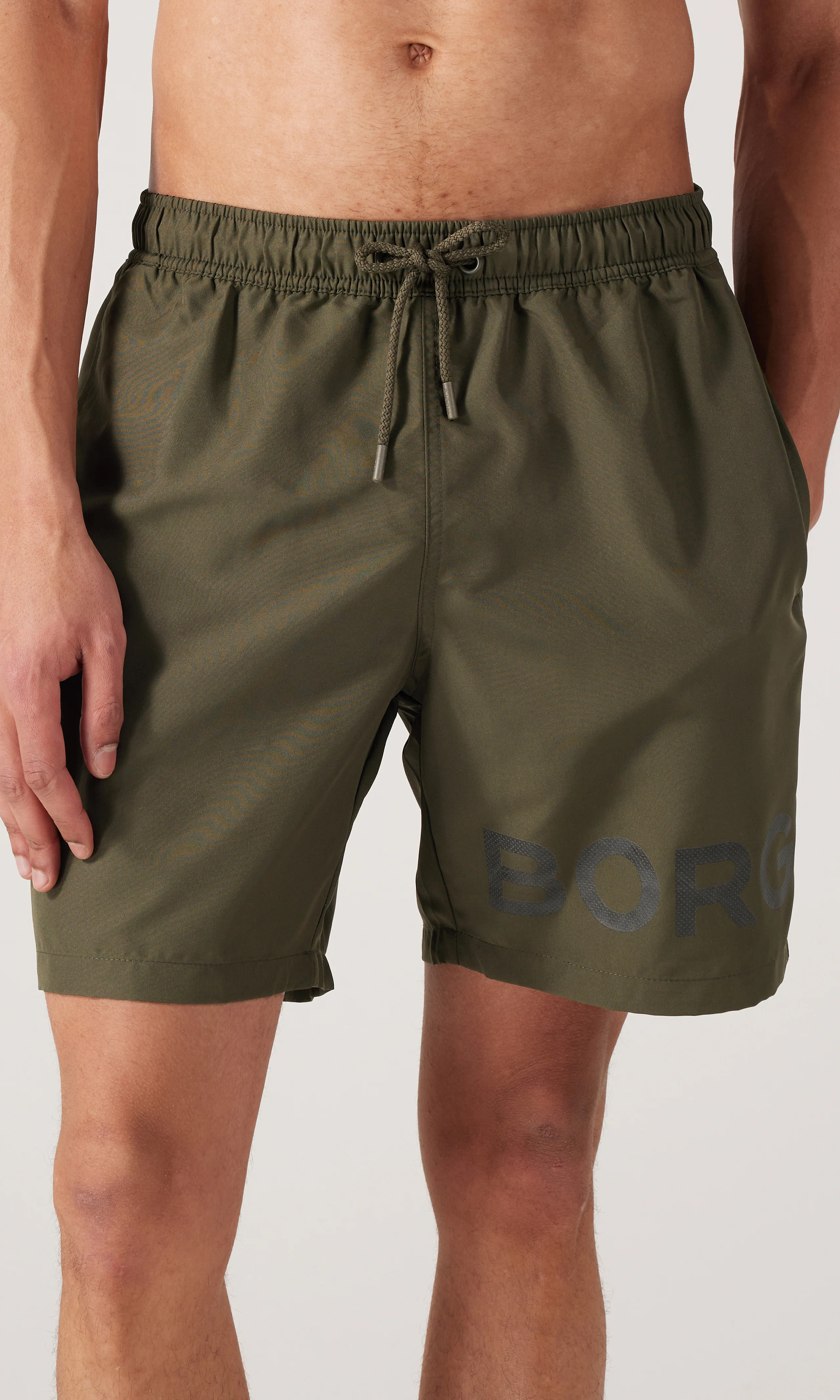 Borg Vihreät Uimashortsit. Front. Model.