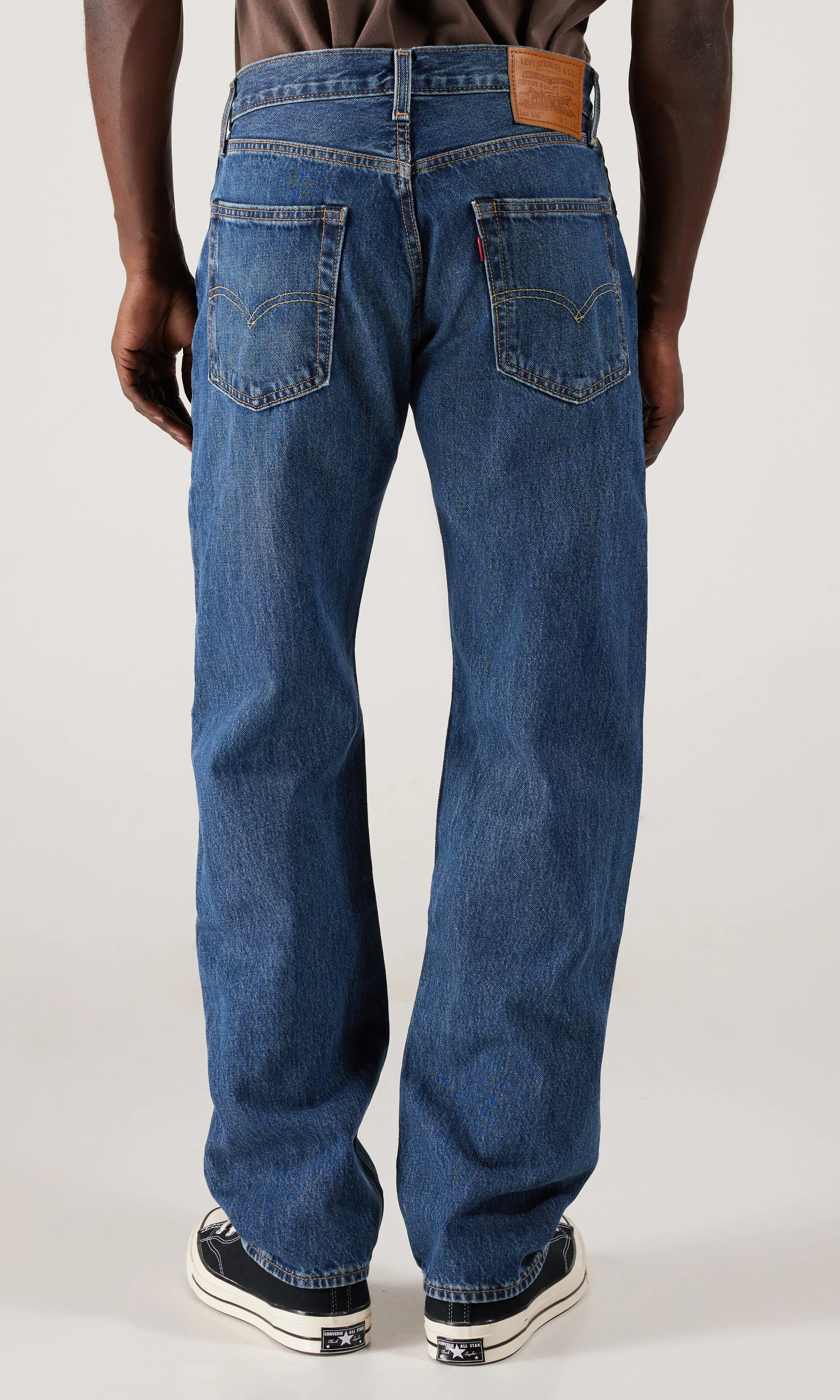 555™ Relaxed Straight Jeans. Back. Model.