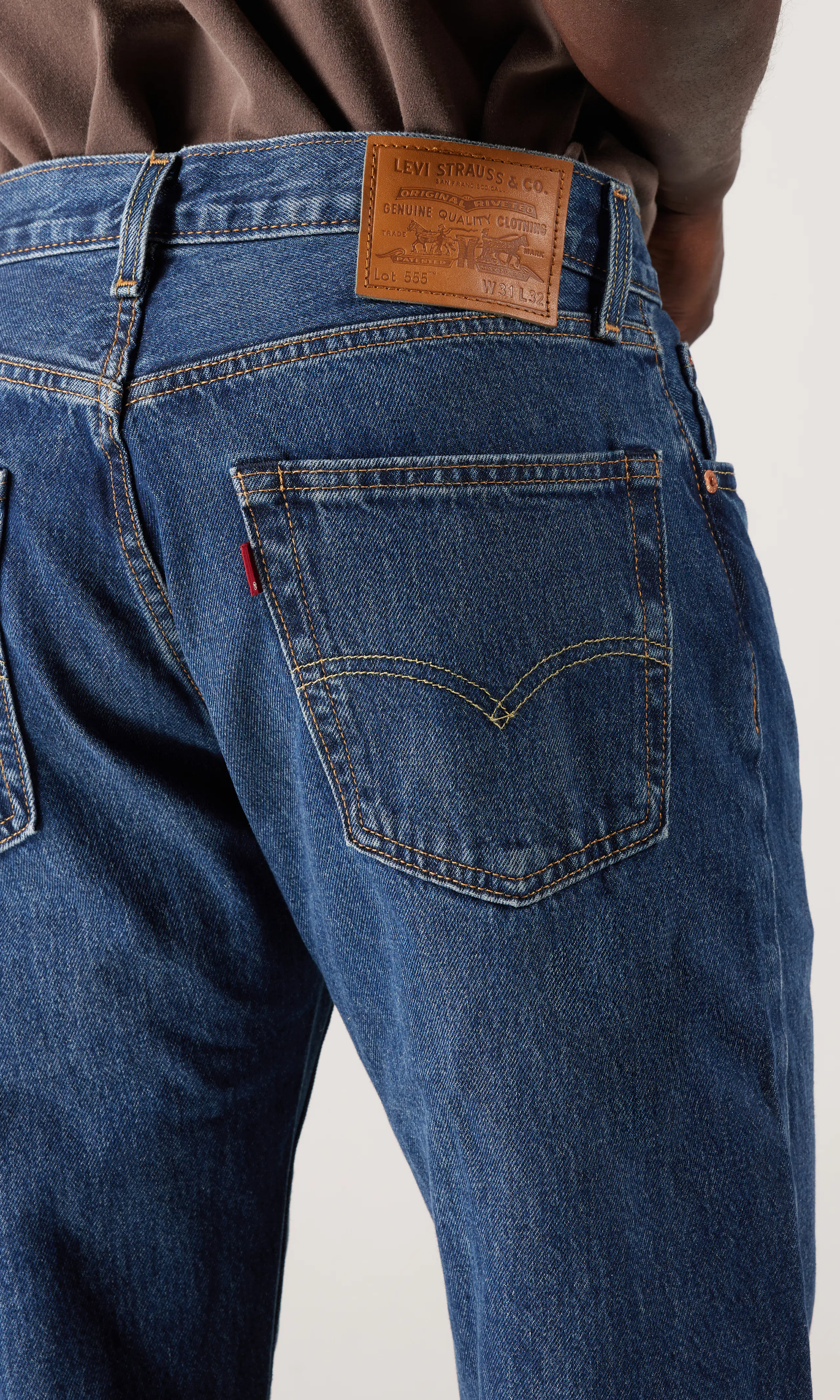 555™ Relaxed Straight Jeans. Detail 1. Model.
