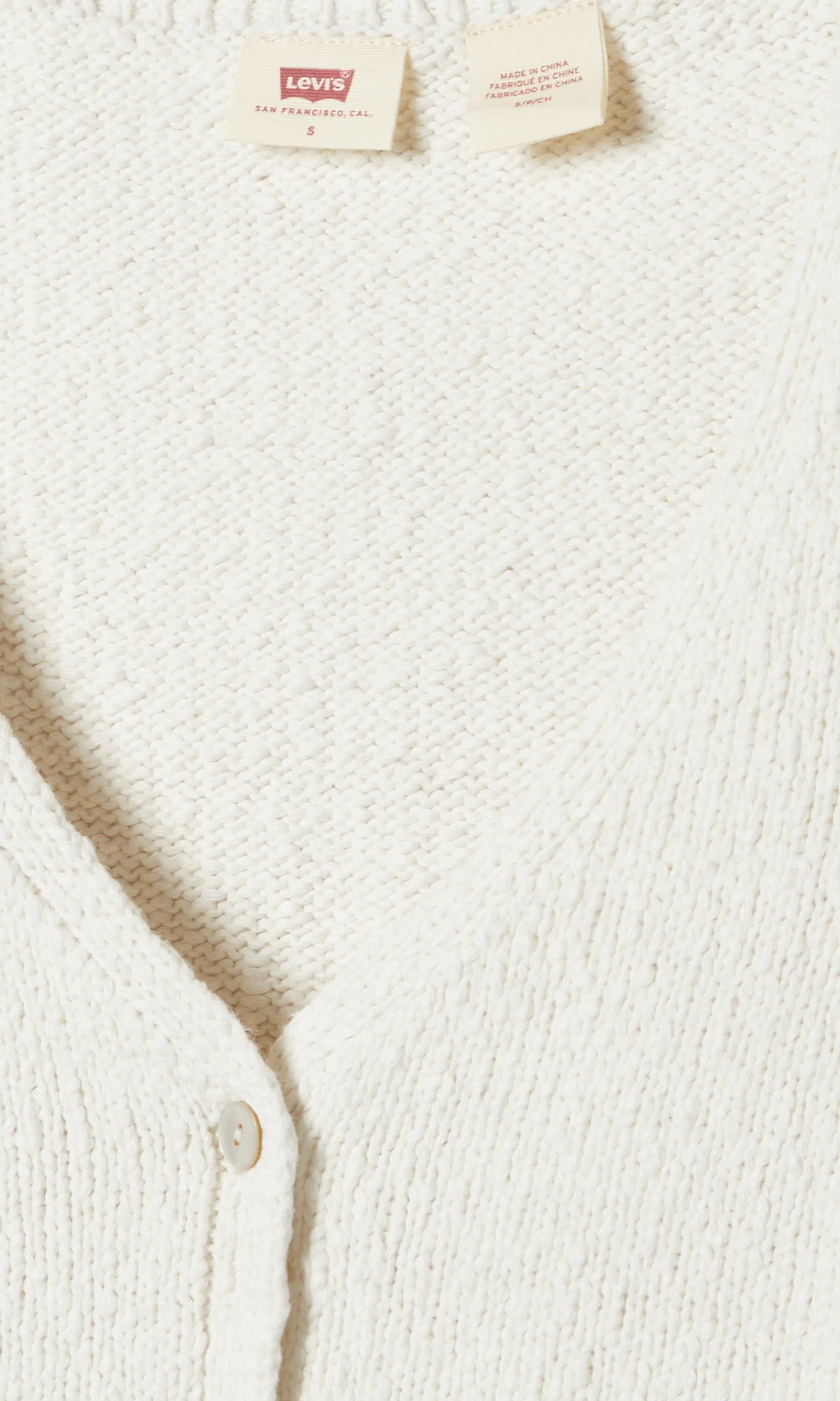Helen Mini Boucle Väst. Detail 1. Flat.
