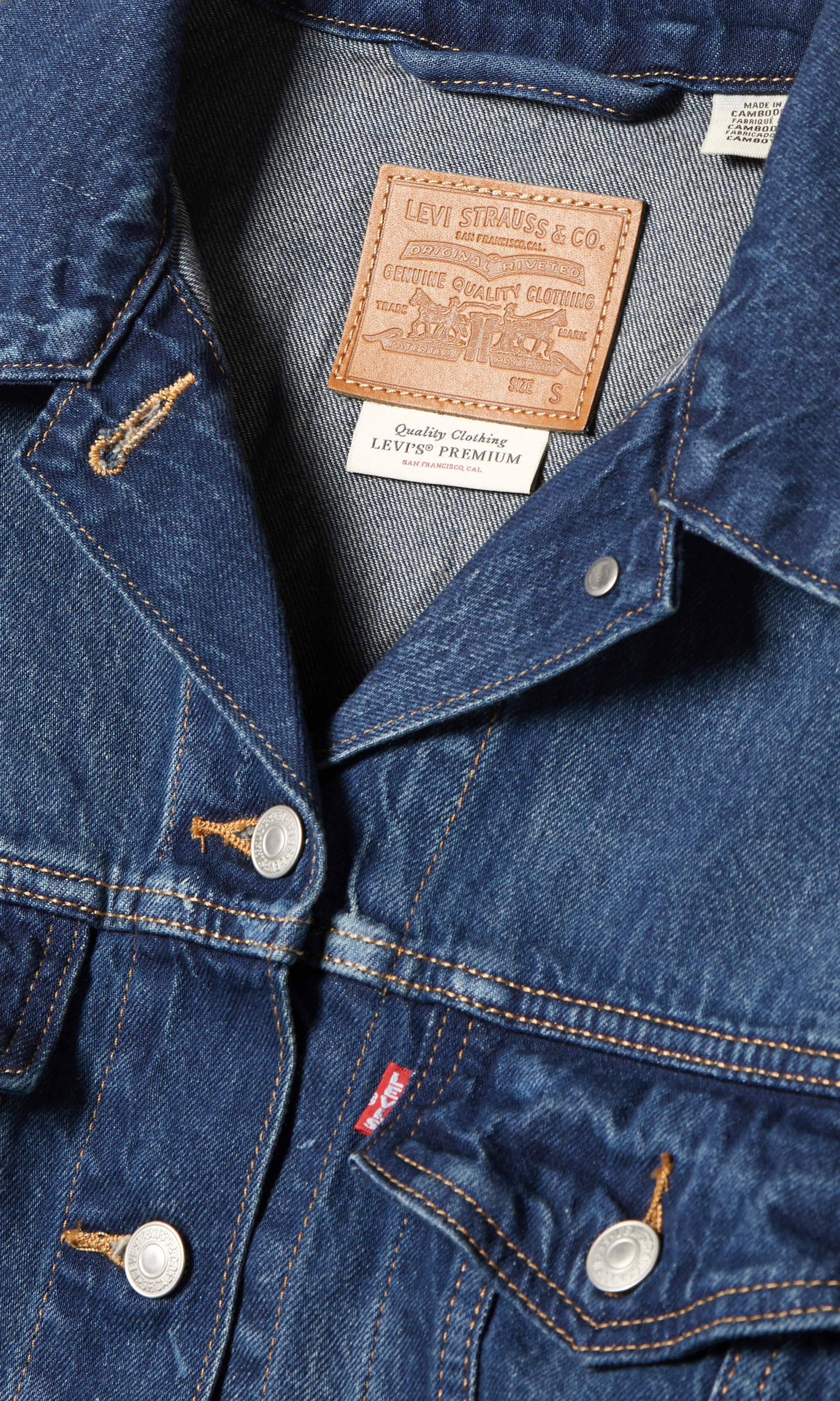 90s Trucker Medium Blå Jacka. Detail 1. Flat.