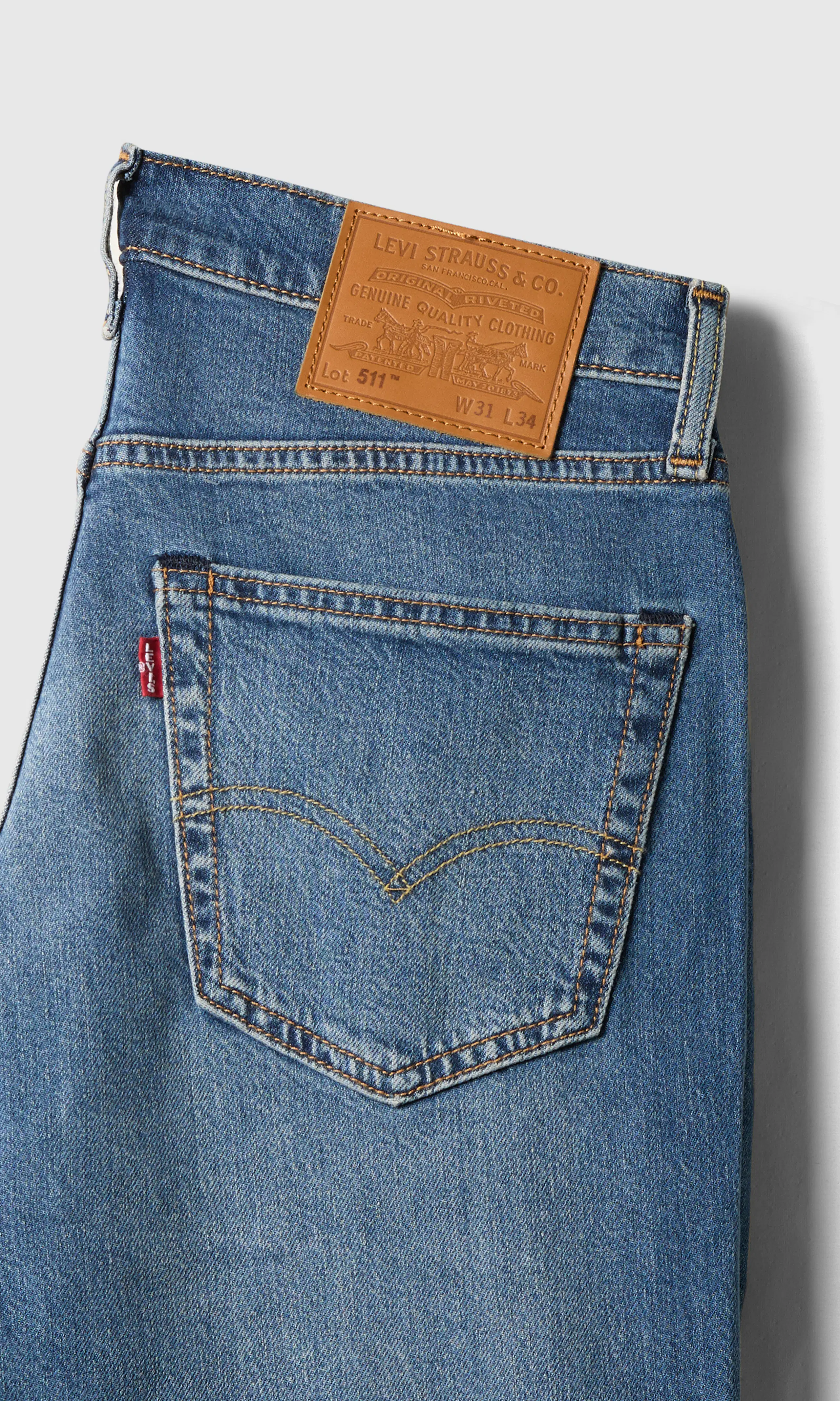 511™ Slim Jeans. Detail 1. Flat.