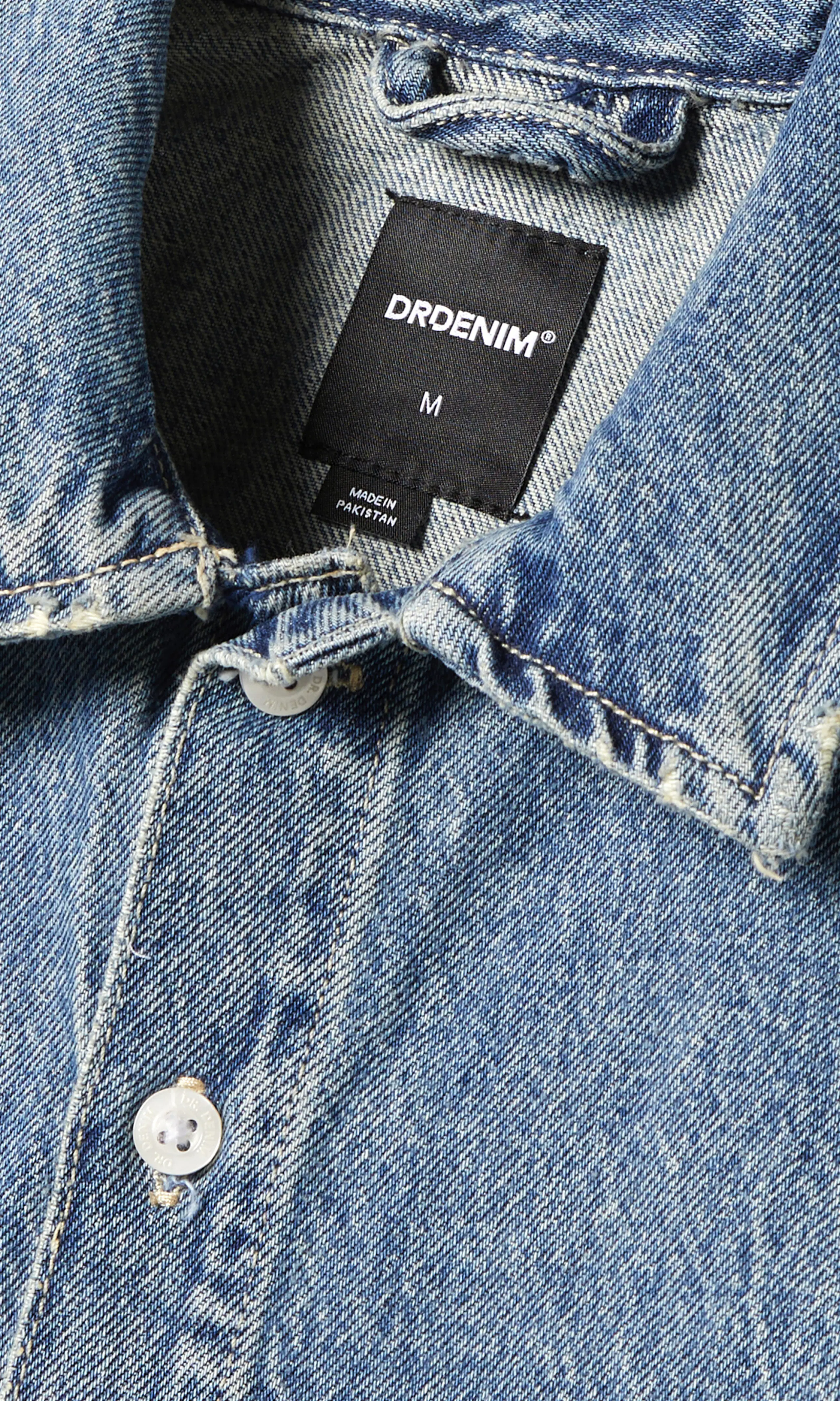 Kye Kortermet Denim Skjorte. Detail 1. Flat.