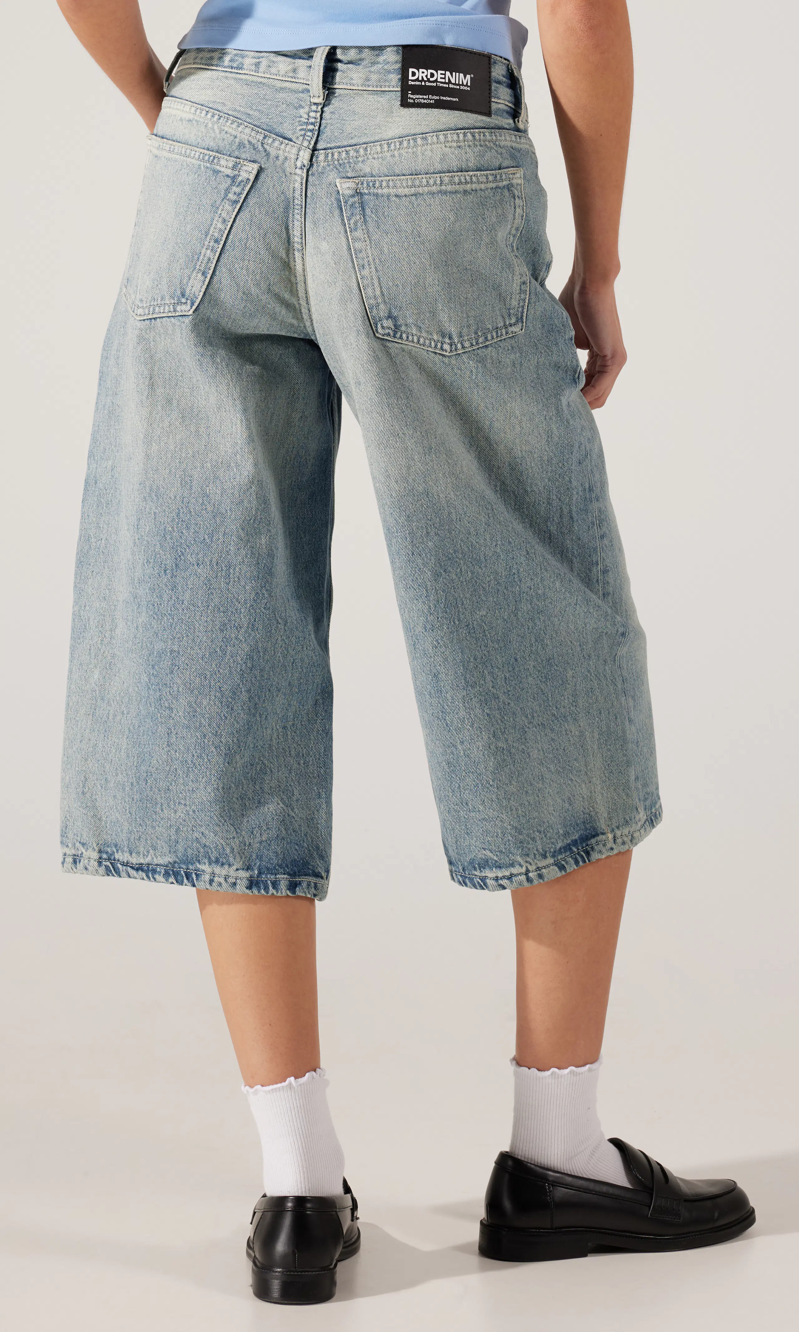 Dace Mid Wide Capri Jeans. Back. Model.