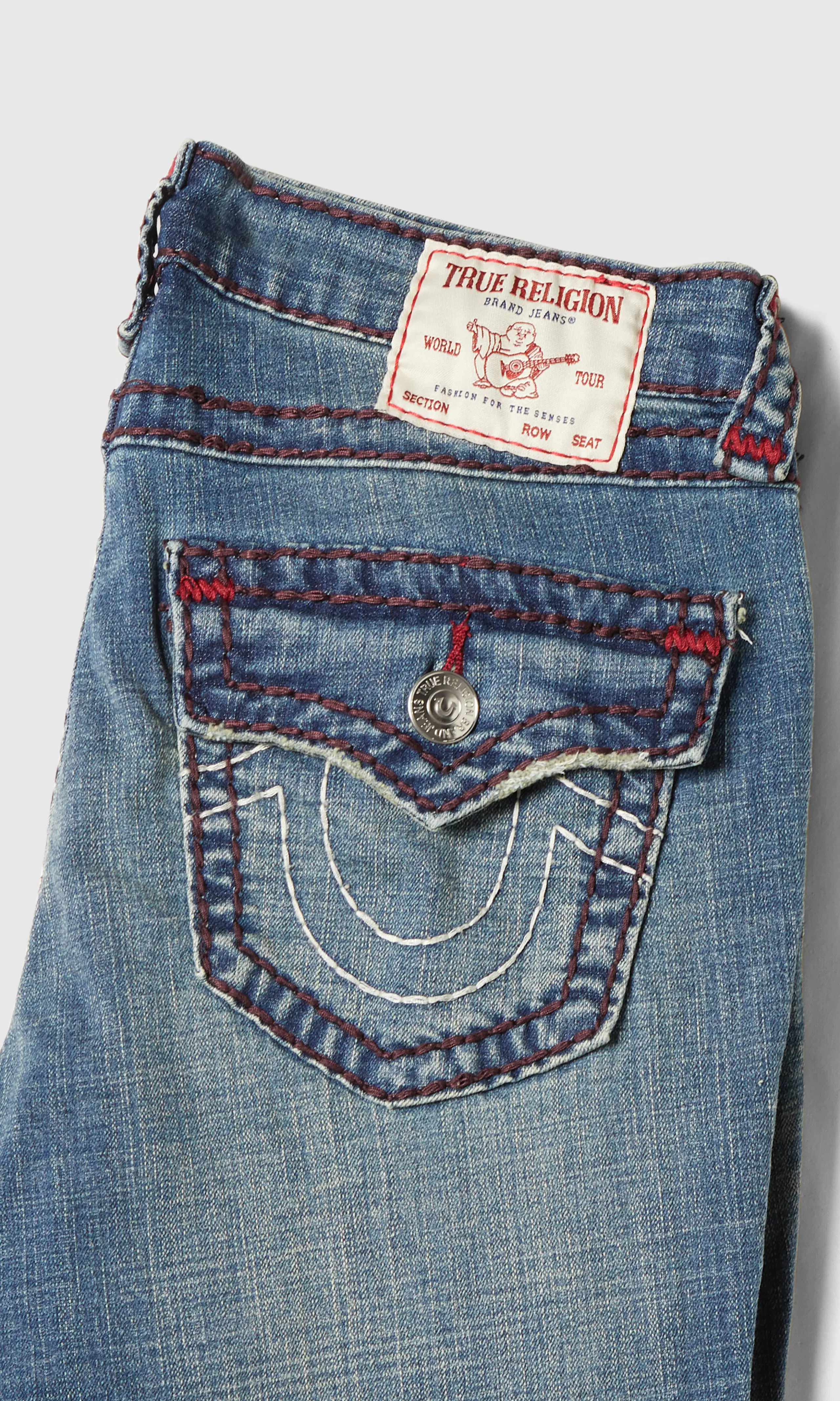 Joey Mid Rise Flare Super T Flap Medium Blå Jeans. Detail 1. Flat.
