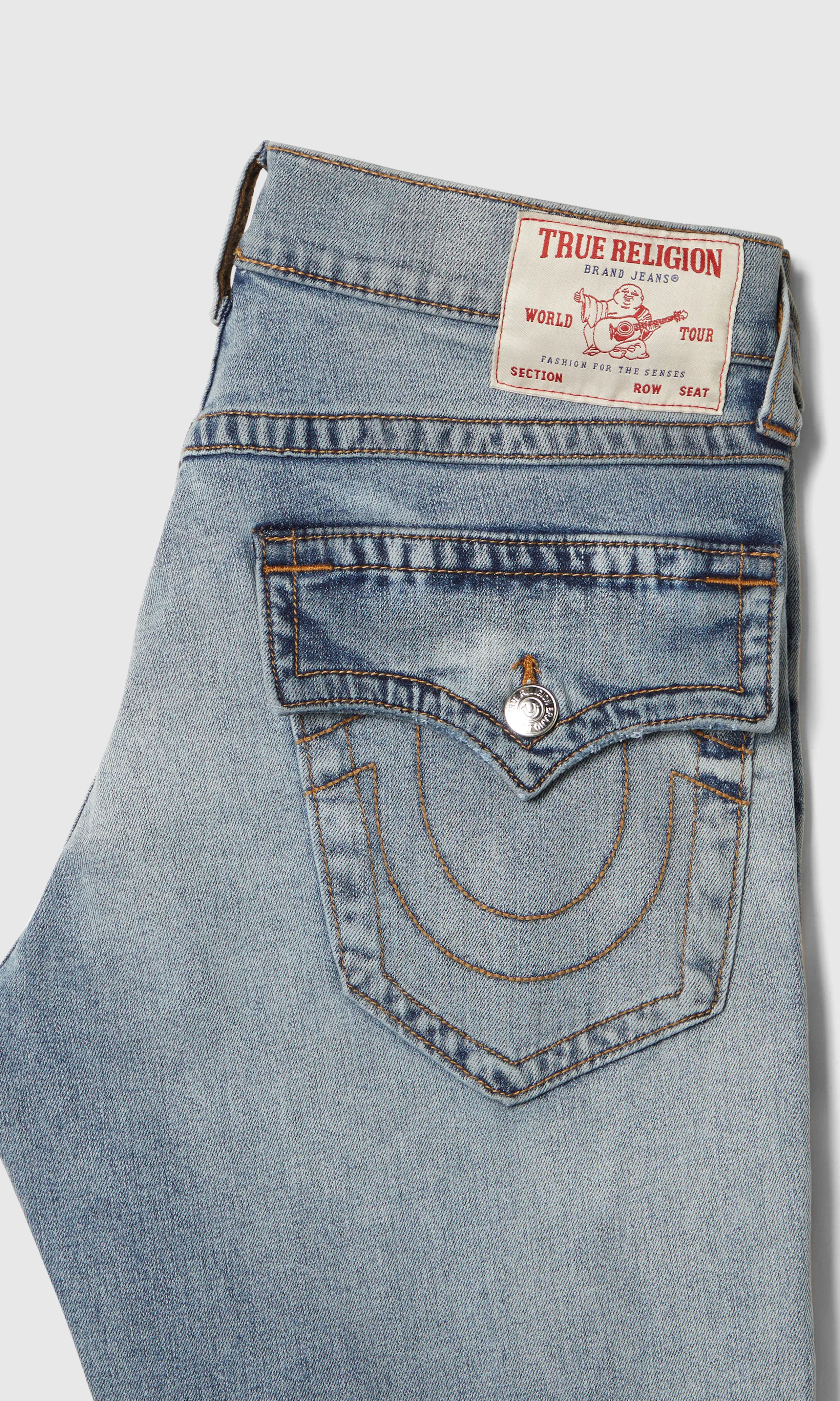 Ricky Flap Ljusblå Jeans. Detail 1. Flat.