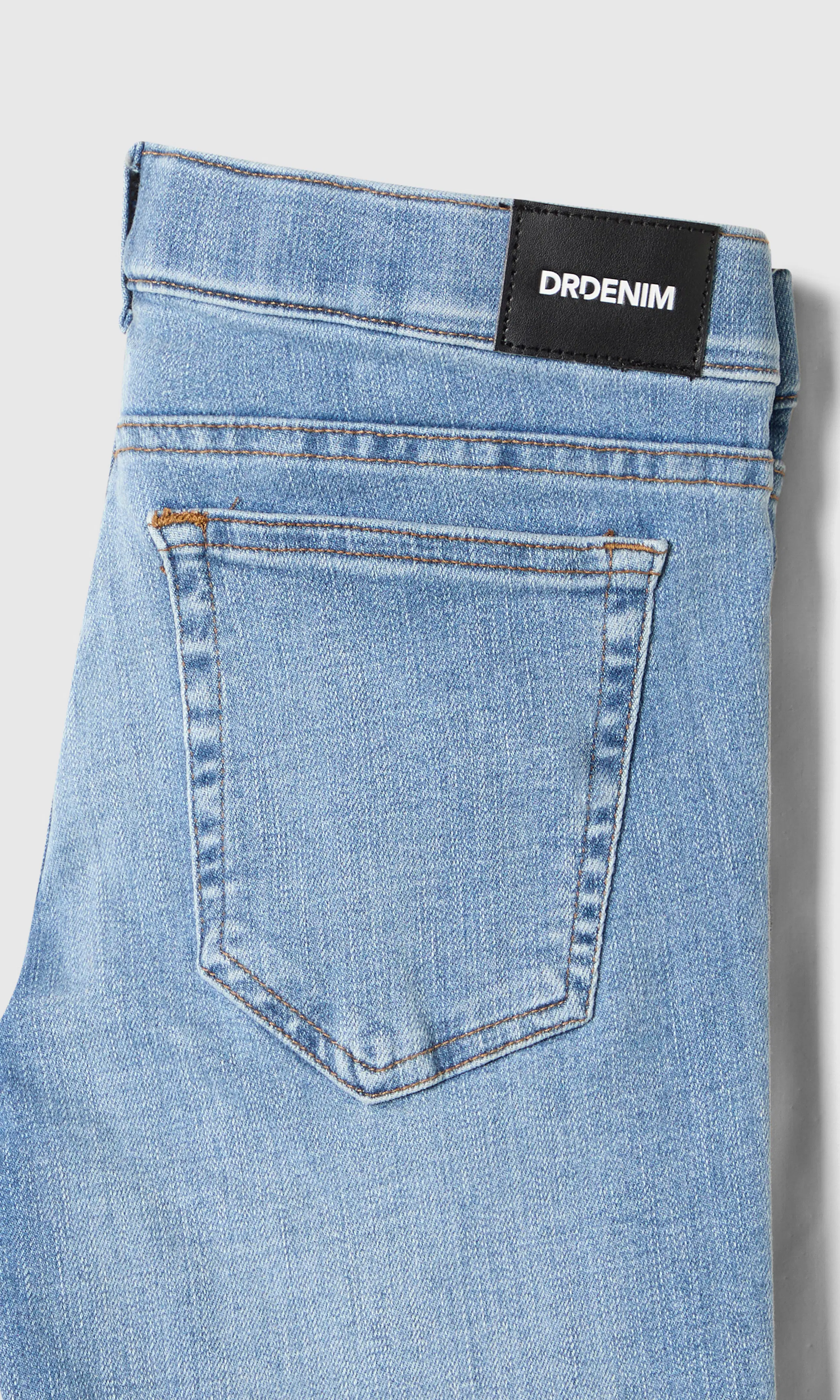 Kily Low Bootcut Lys Blå Jeans. Detail 1. Flat.