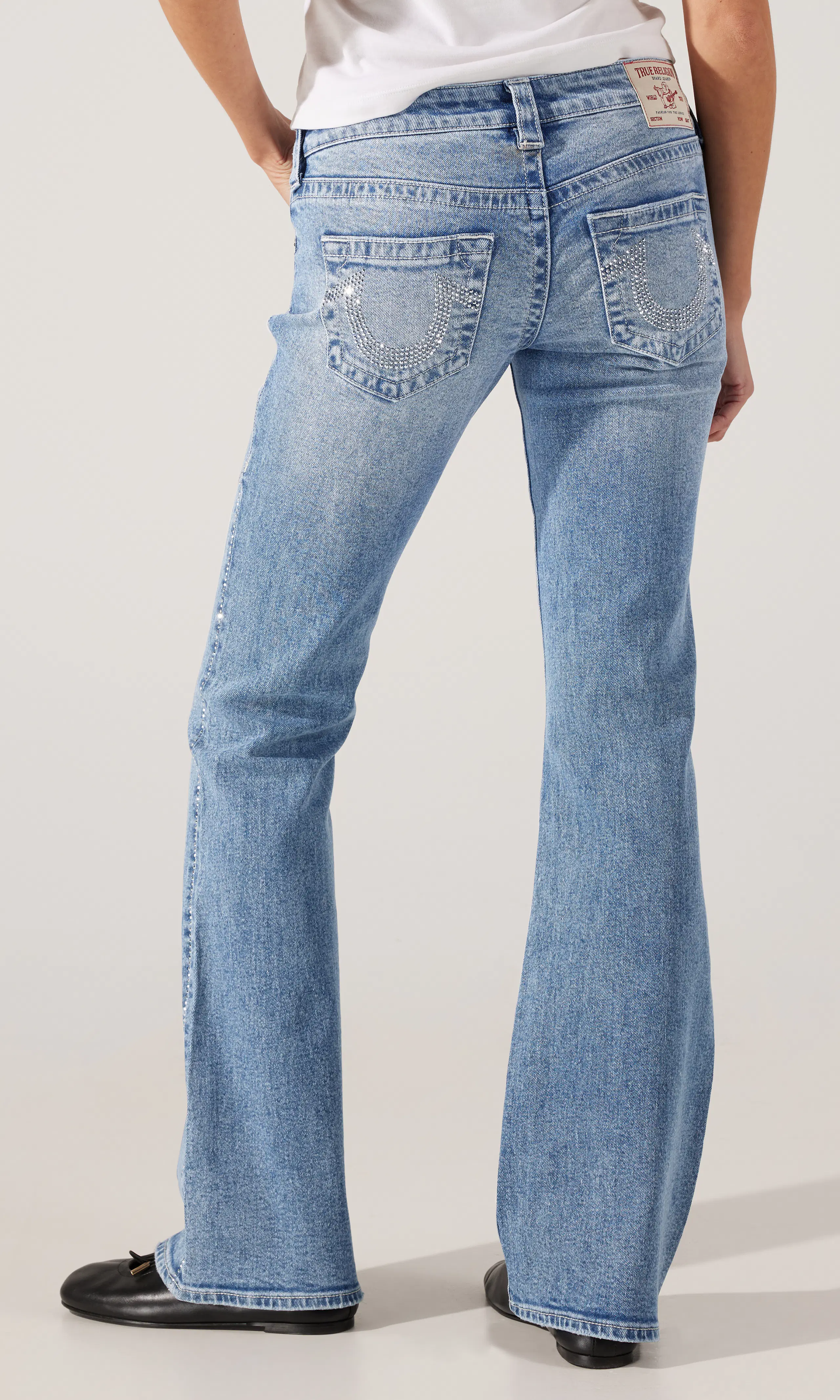 Crystal Becca Low Rise Boot Jeans. Back. Model.