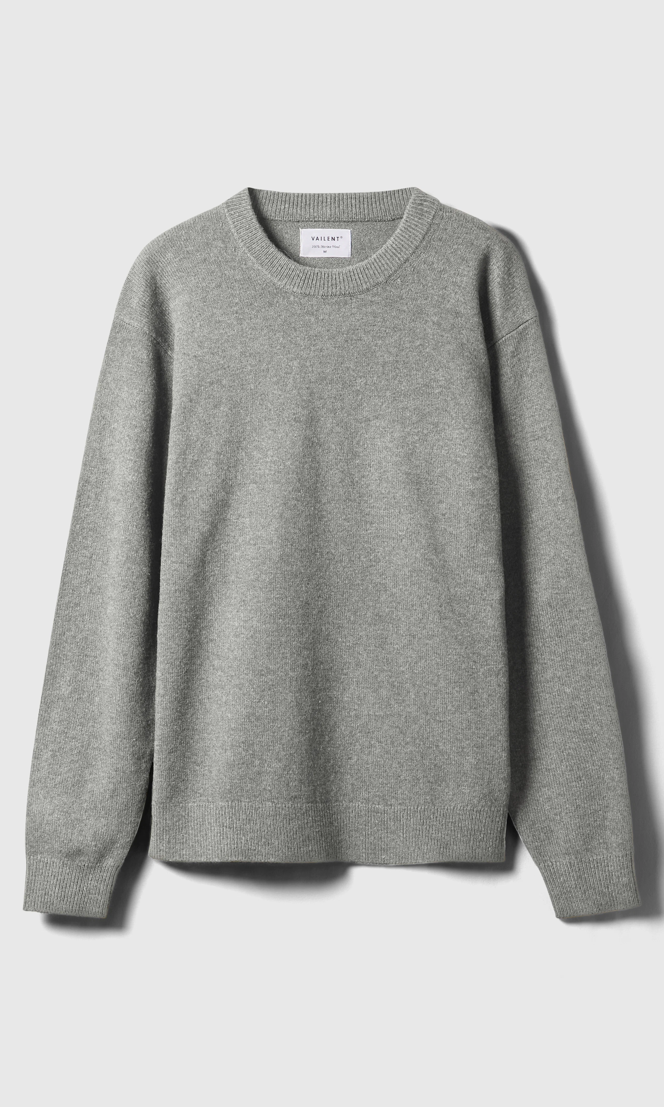 Merino Crew Strikkegenser. Front. Flat.