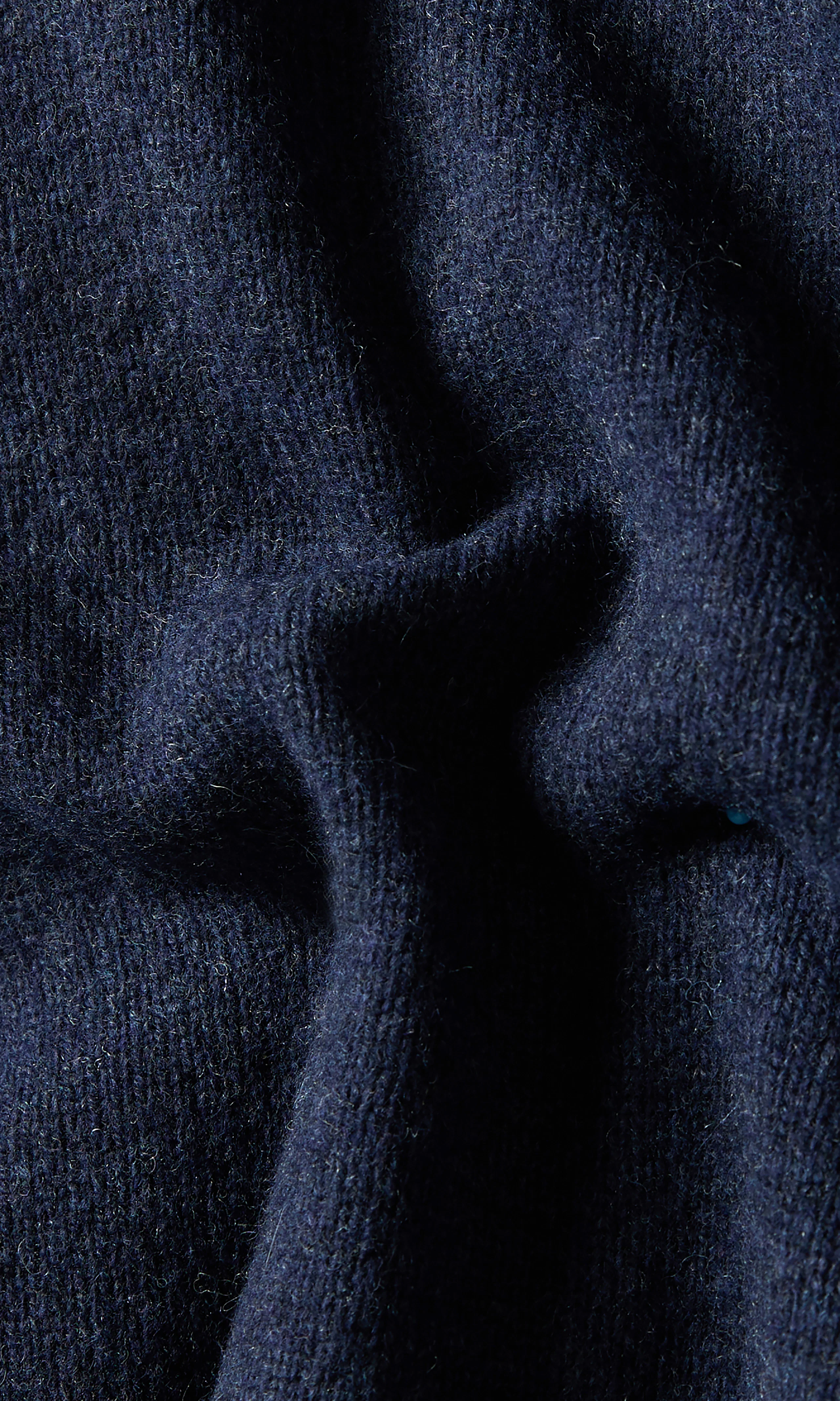 Merino Full Zip Strikkegenser. Detail 2. Flat.