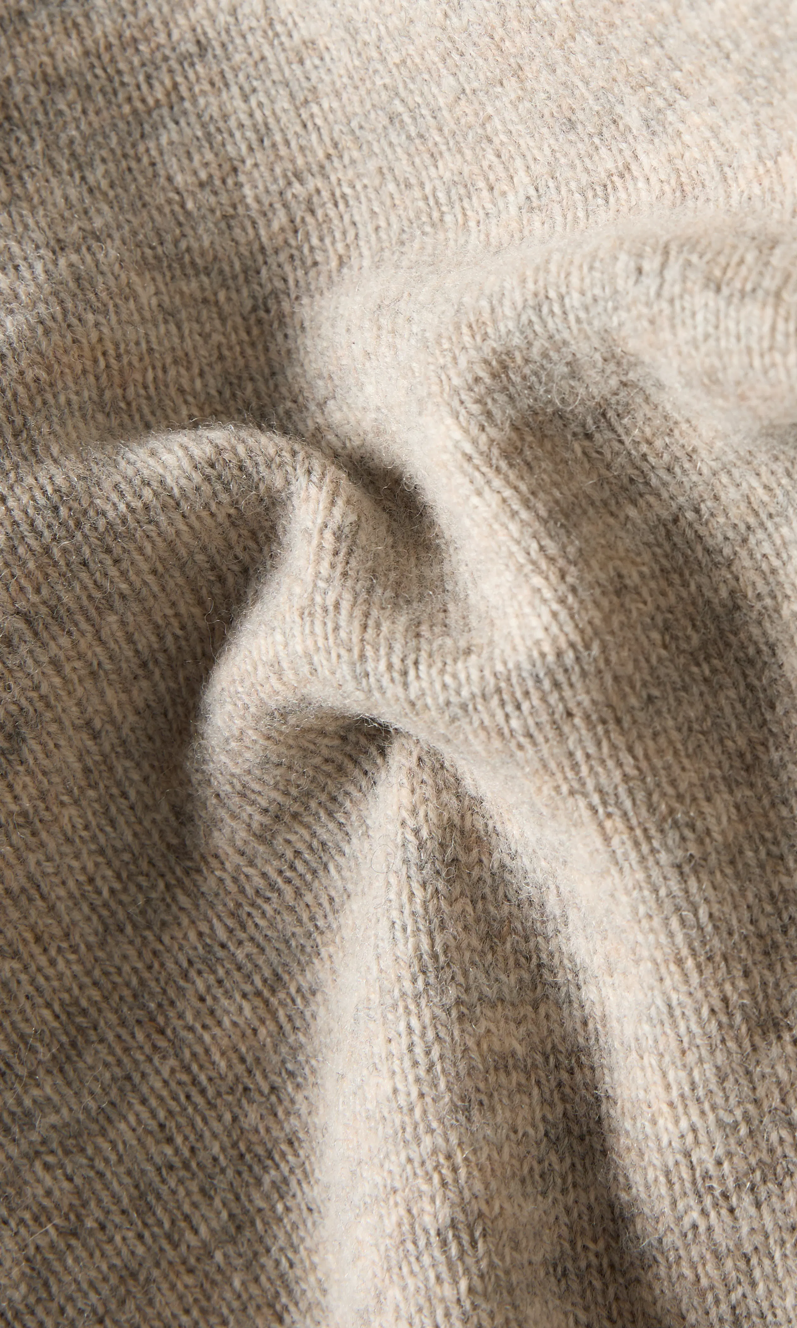 Merino Full Zip Strikkegenser. Detail 2. Flat.