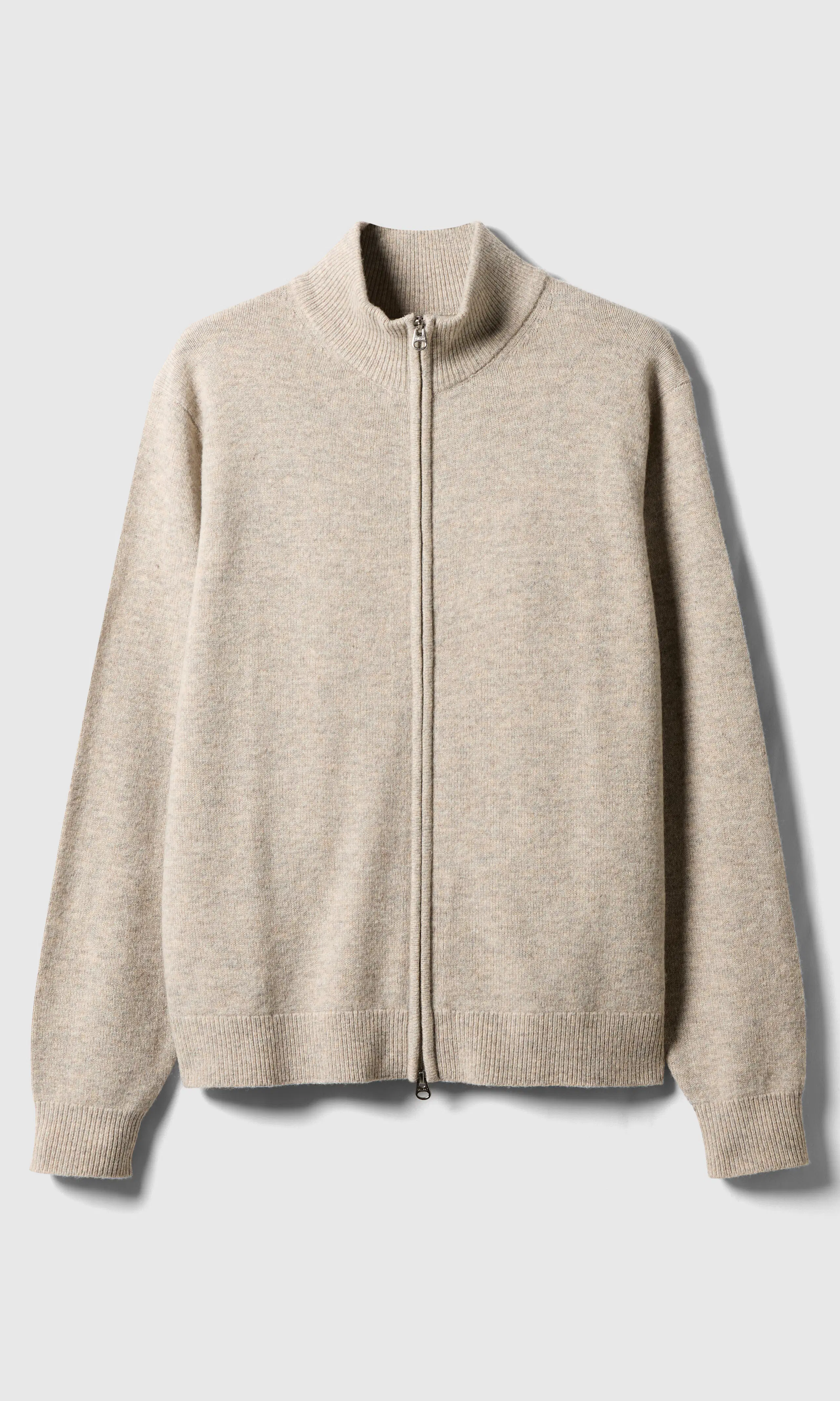 Merino Full Zip Strikkegenser. Front. Flat.