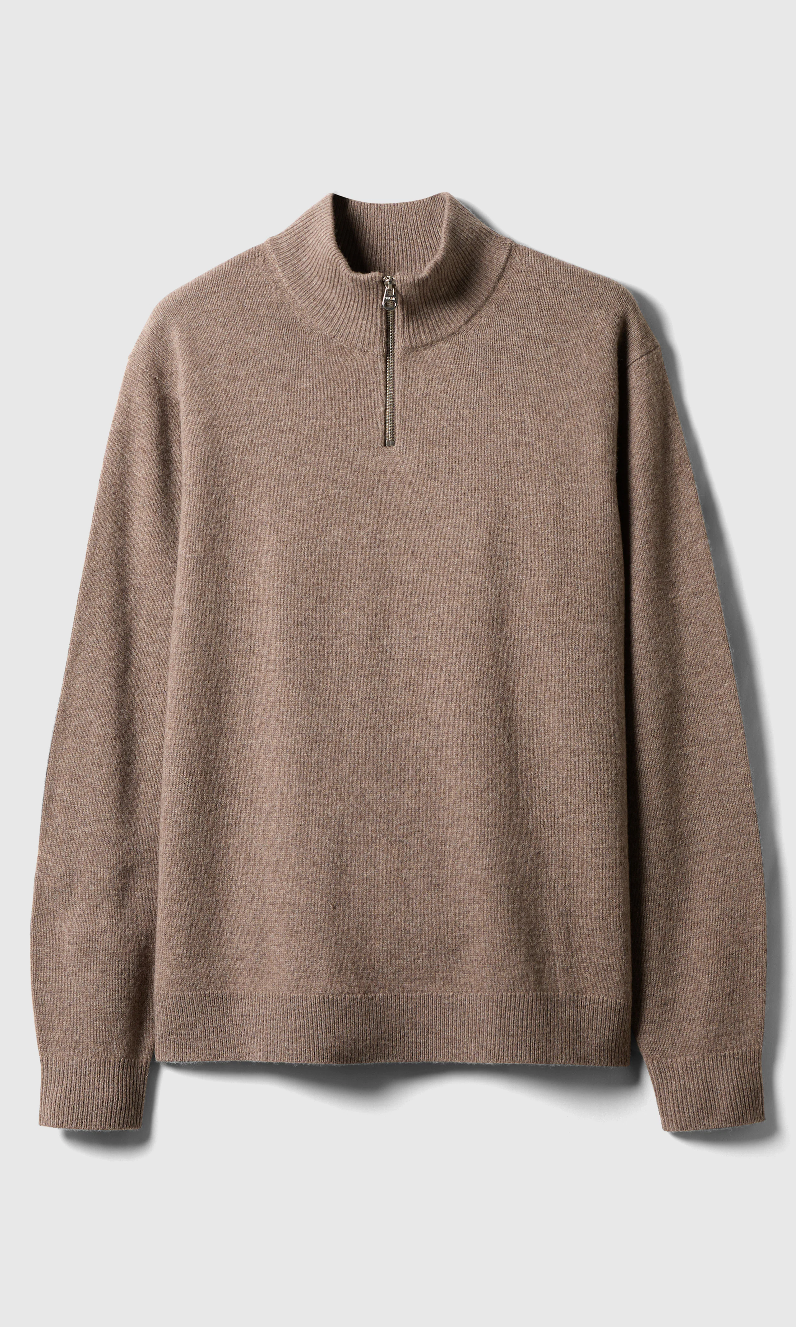 Merino Half Zip Strikkegenser. Front. Flat.
