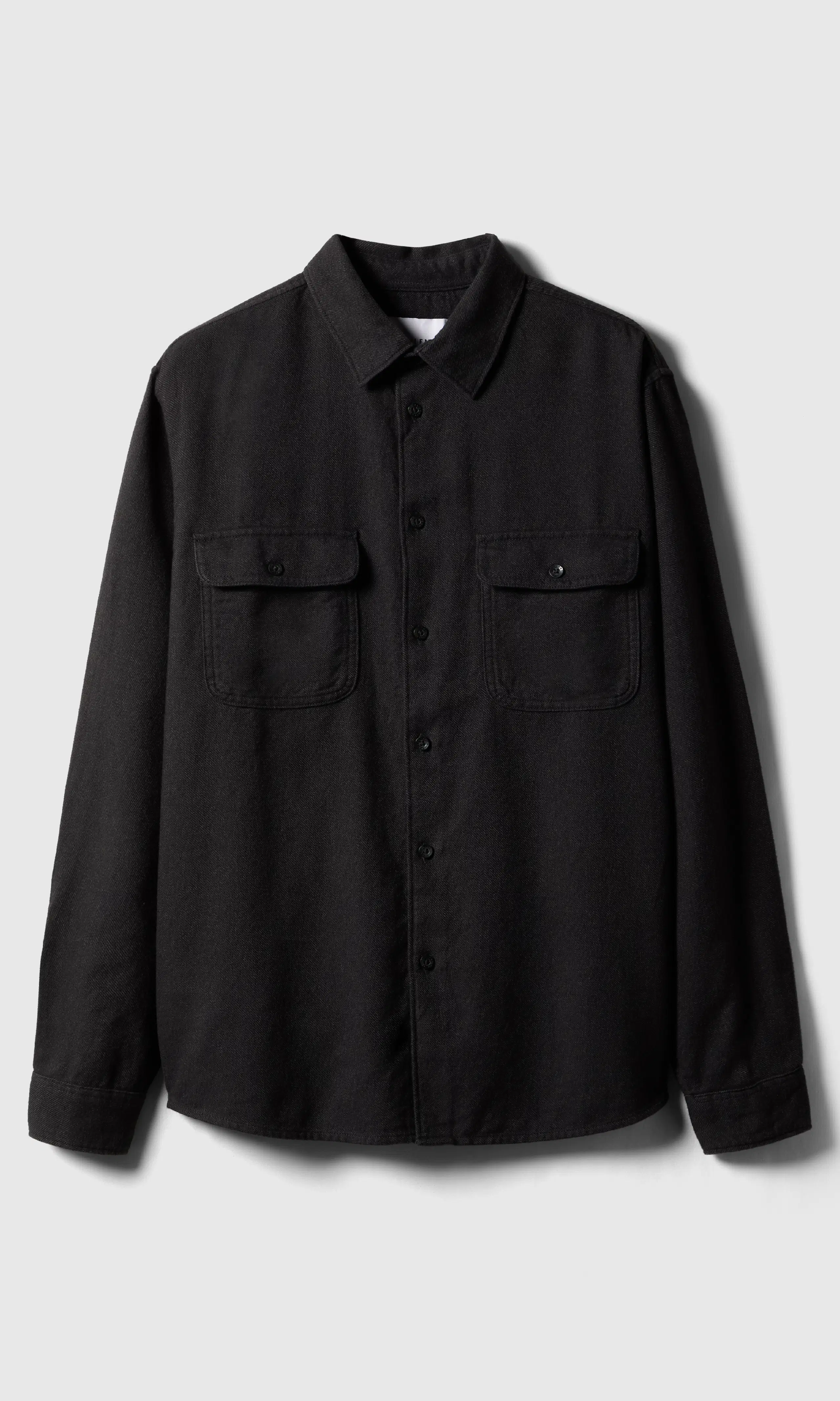 Twist Skjorte. Front. Flat.