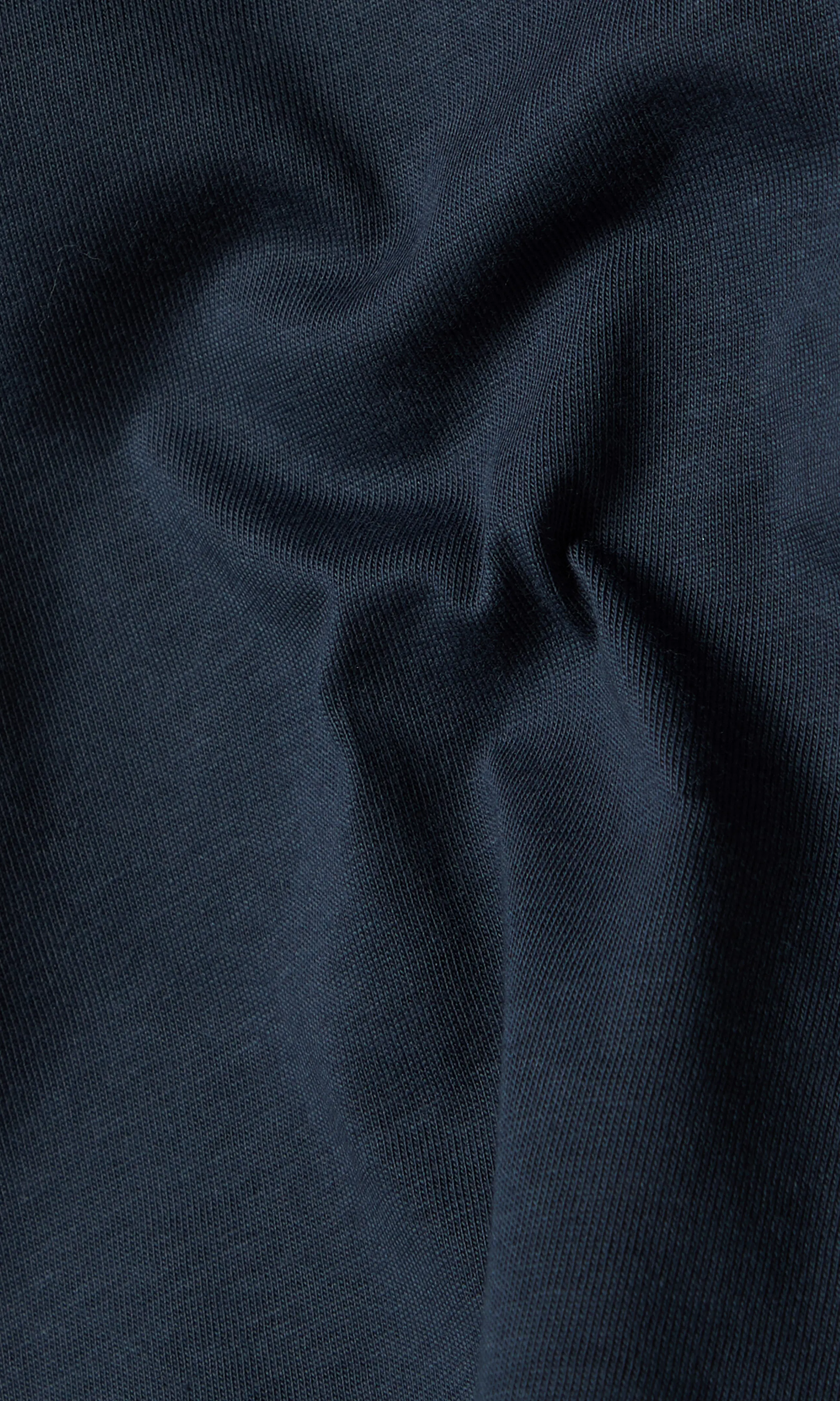Beaumont T-Skjorte. Detail 2. Flat.