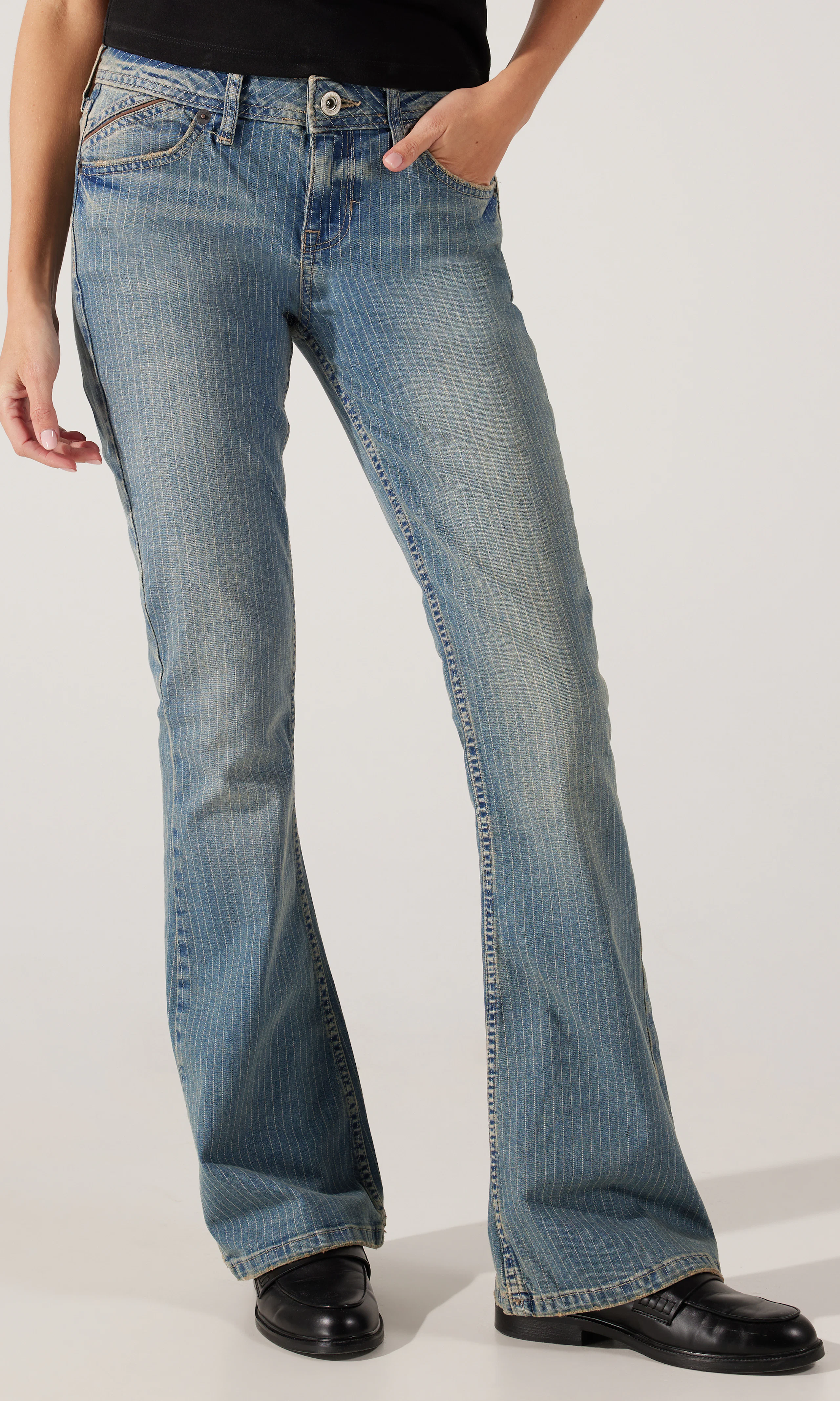 Brooke Pinstripe Flare Low Rise Jeans. Front. Model.